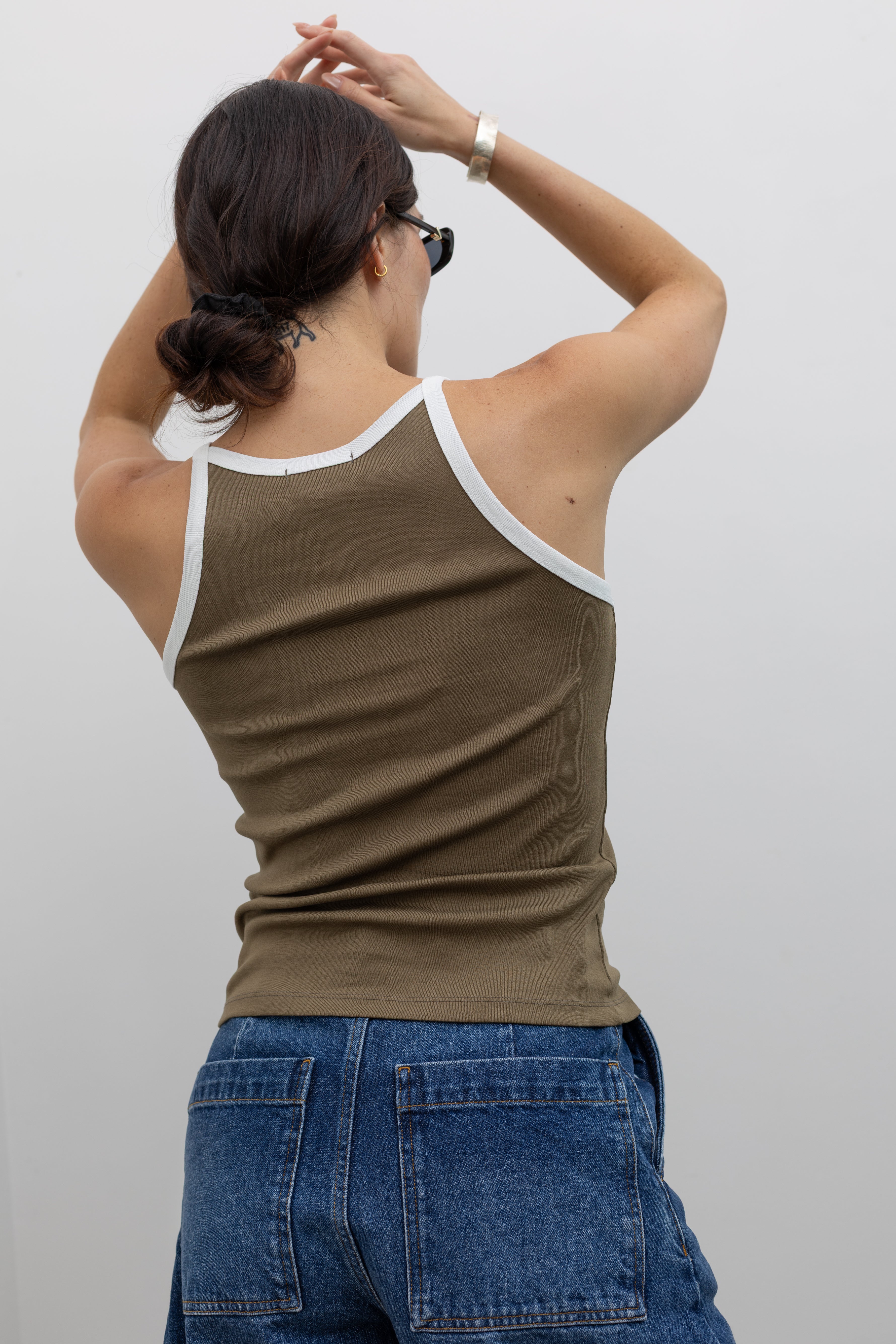 Collective khaki ribbed tank with white contrast trim at Alas Eius