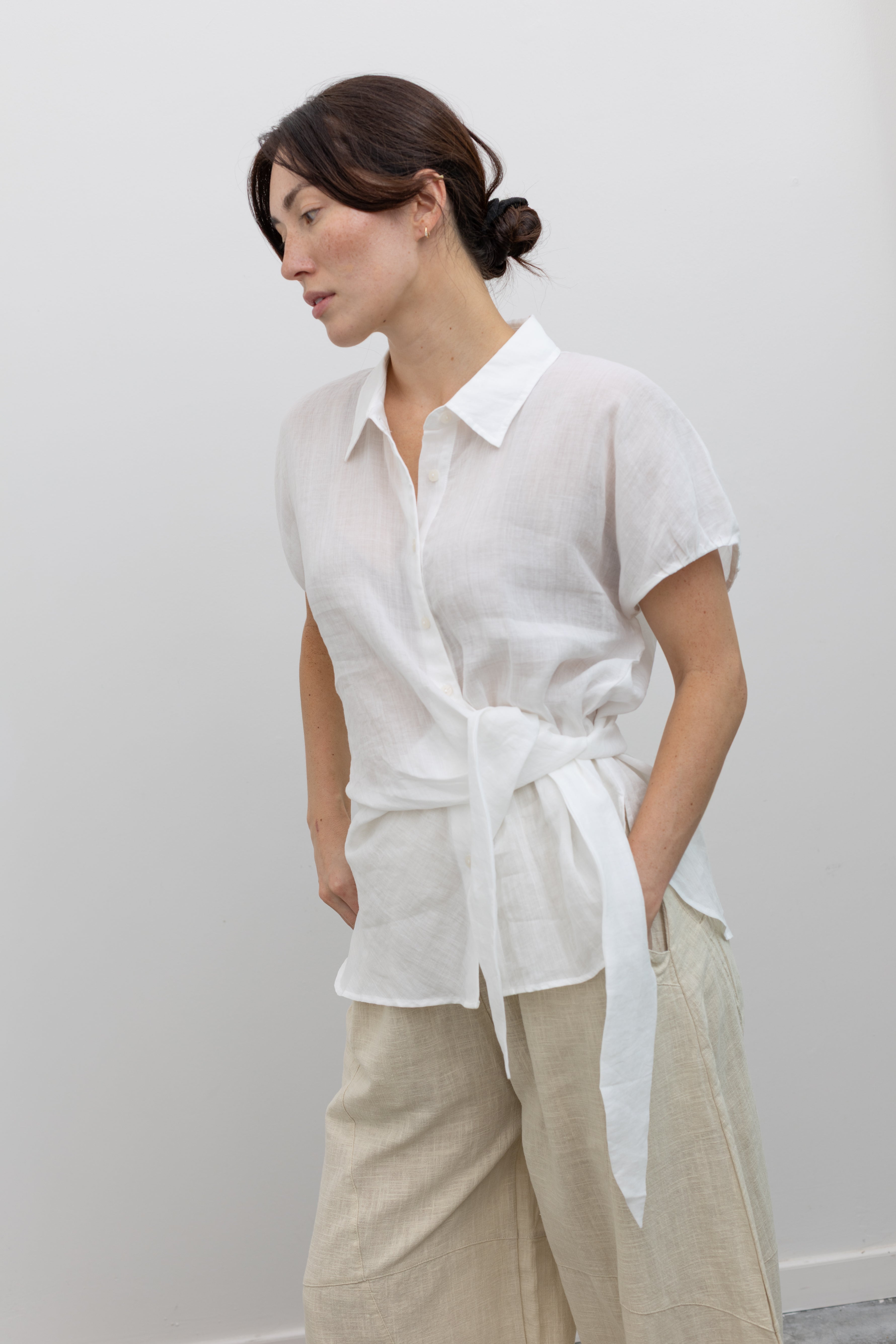 Collective lightweight tunic top with side tie accents and cap sleeves at Alas Eius