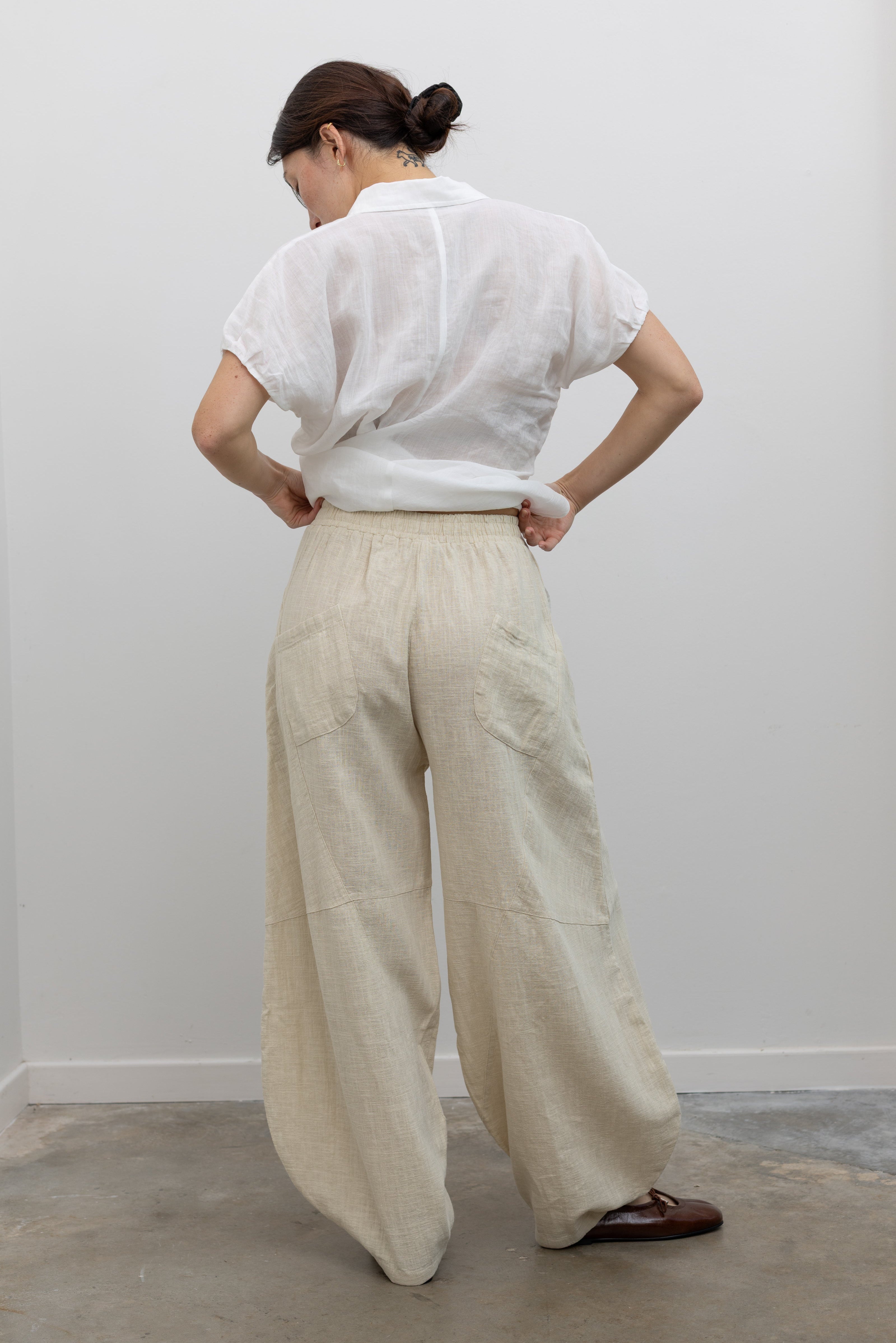 Collective cotton linen blend wide barrel pants styled with a contemporary relaxed fit at Alas Eius