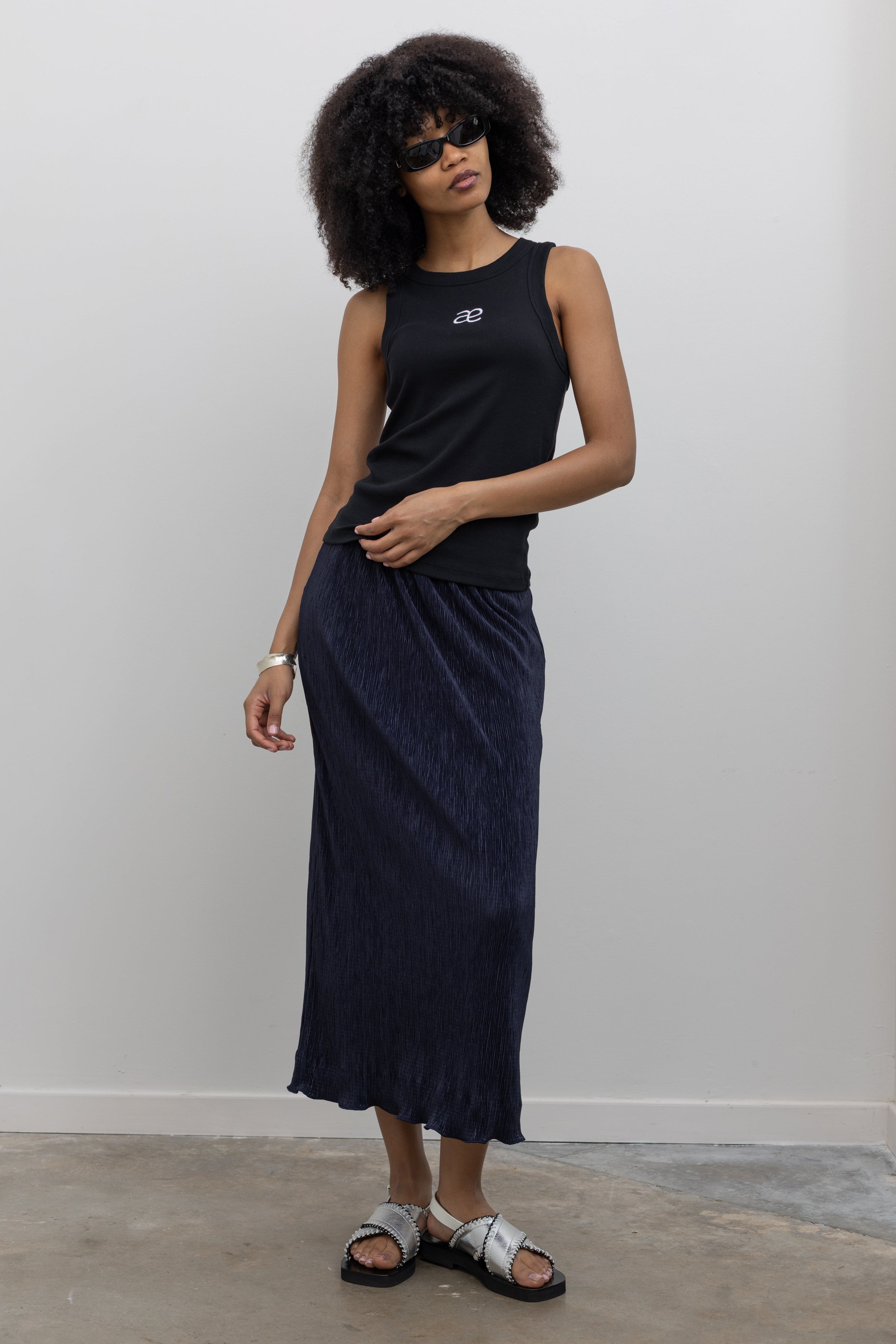 Collective minimalist navy column plissé skirt at Alas Eius
