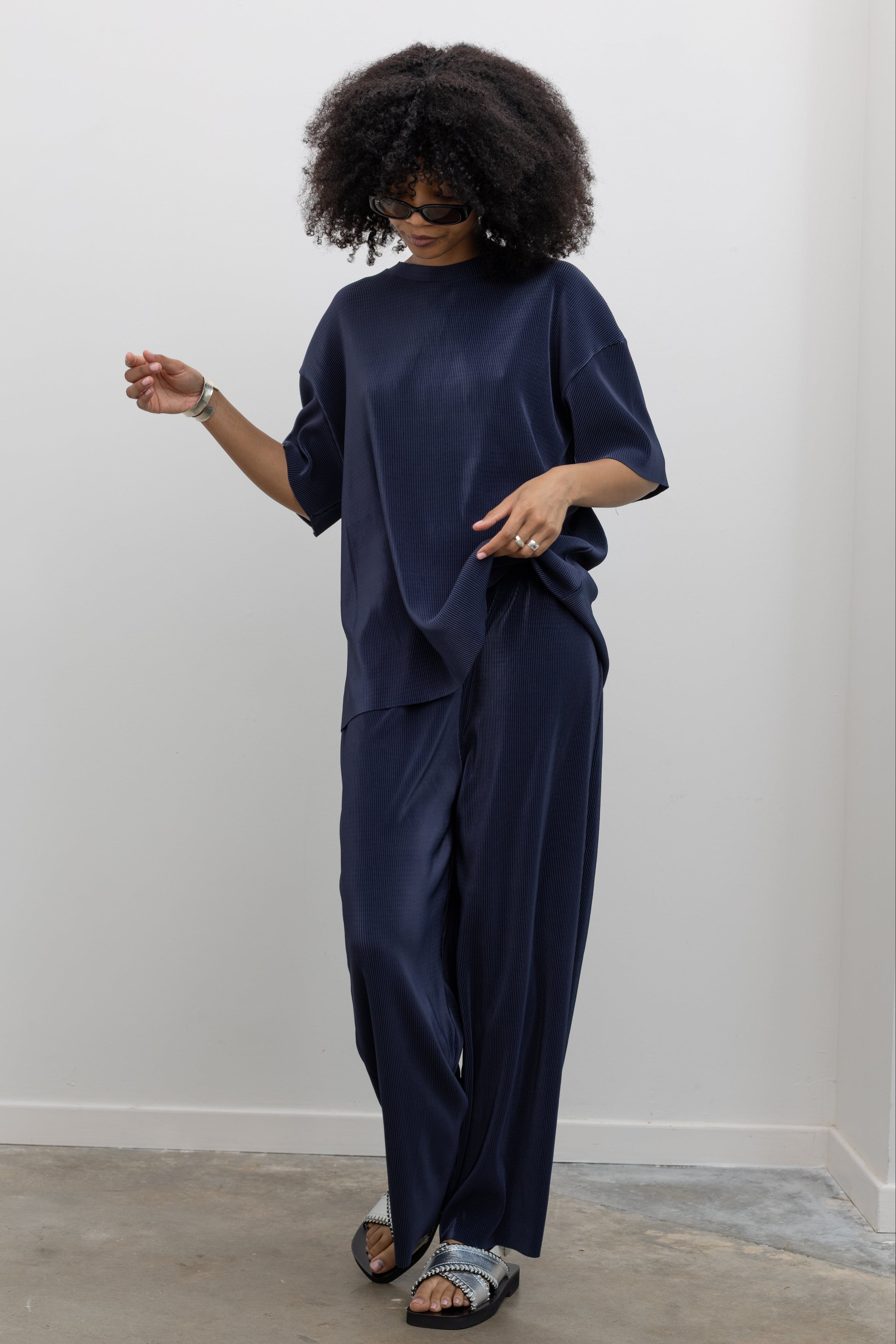 Collective minimalist navy ribbed wide-leg pants for women at Alas Eius