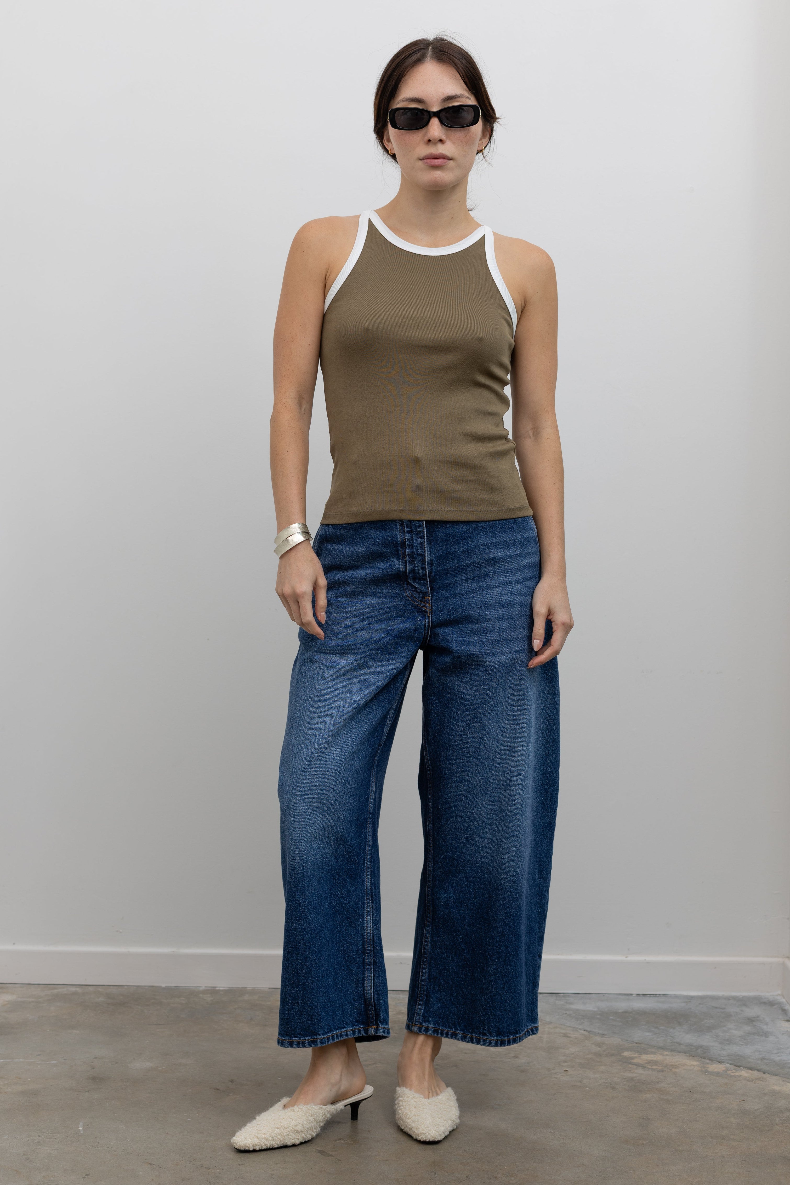 Collective olive rib knit tank styled for elevated casual dressing at Alas Eius