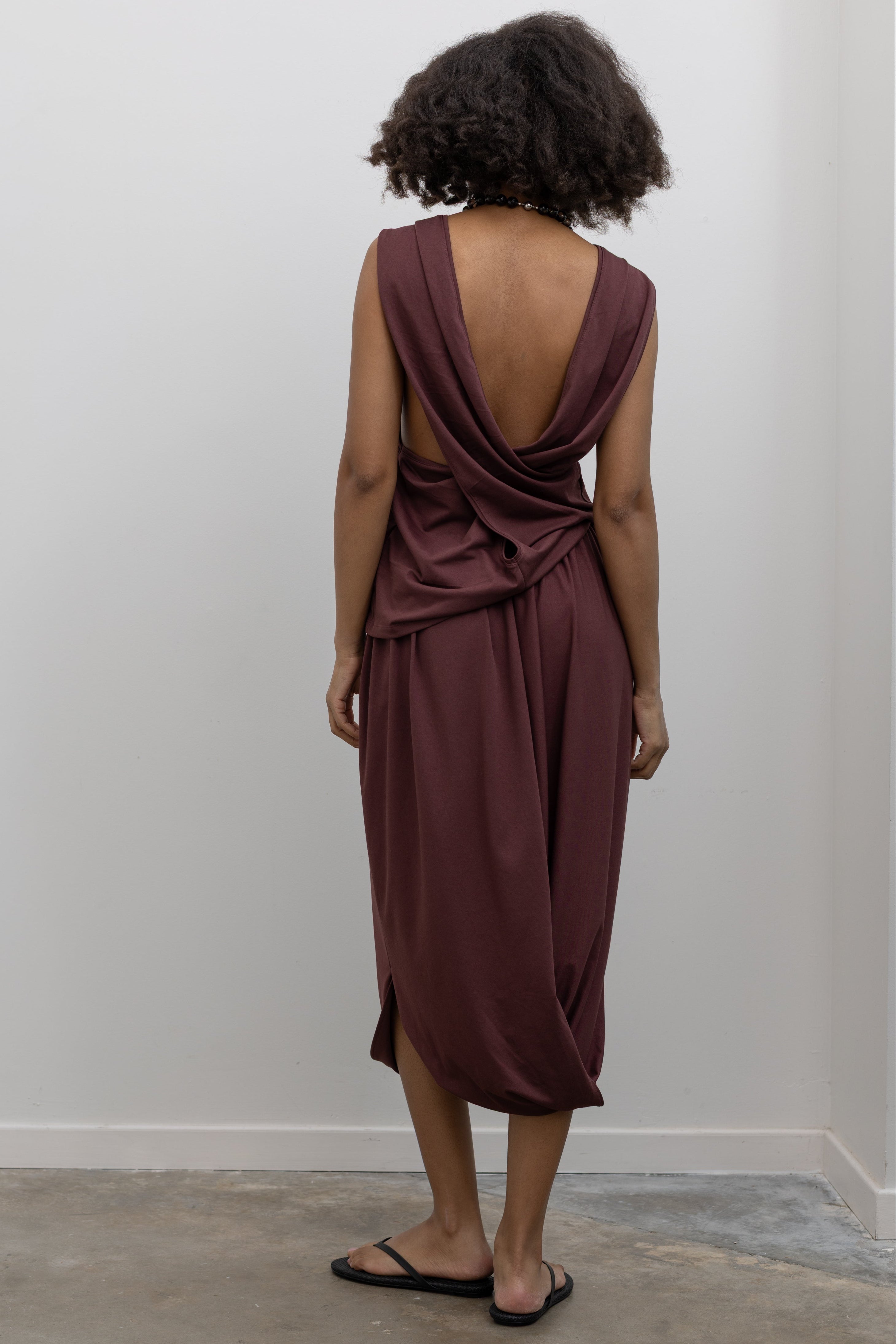 Collective modern cocoon midi skirt with gathered waistband and draped hem at Alas Eius