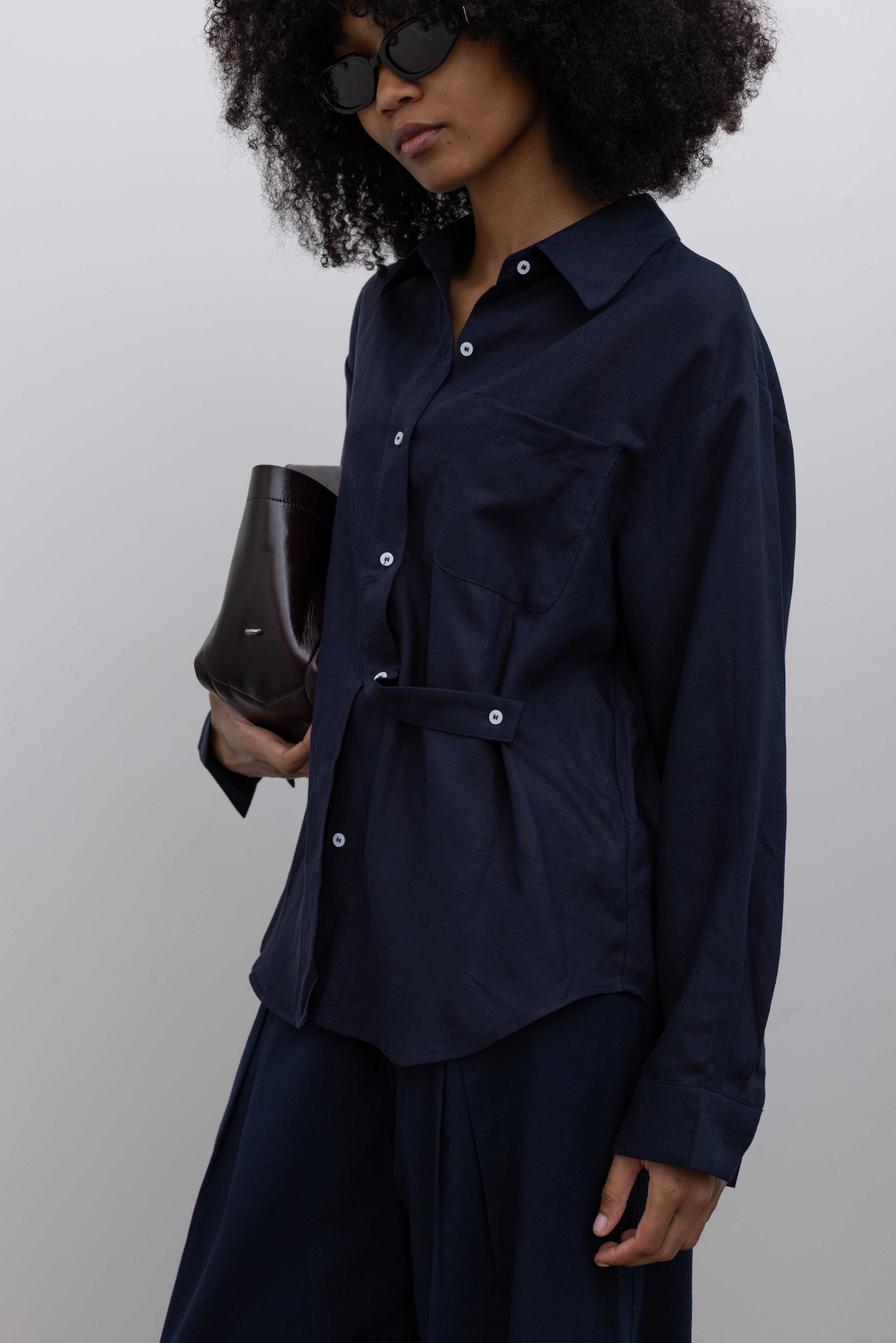 Collective navy cotton linen oversized button-down shirt with adjustable side tabs at Alas Eius