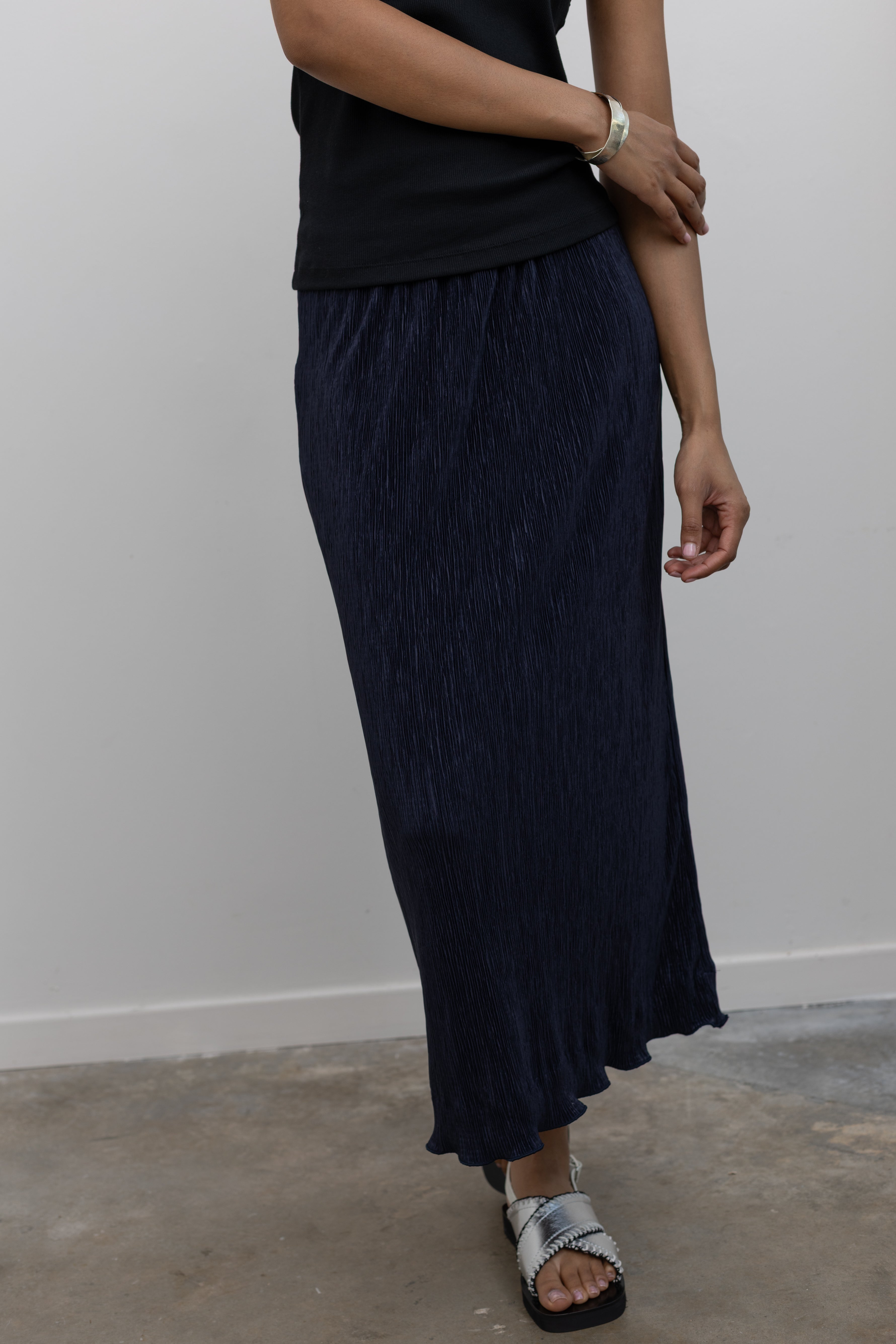 Collective navy micro-pleated column midi skirt at Alas Eius