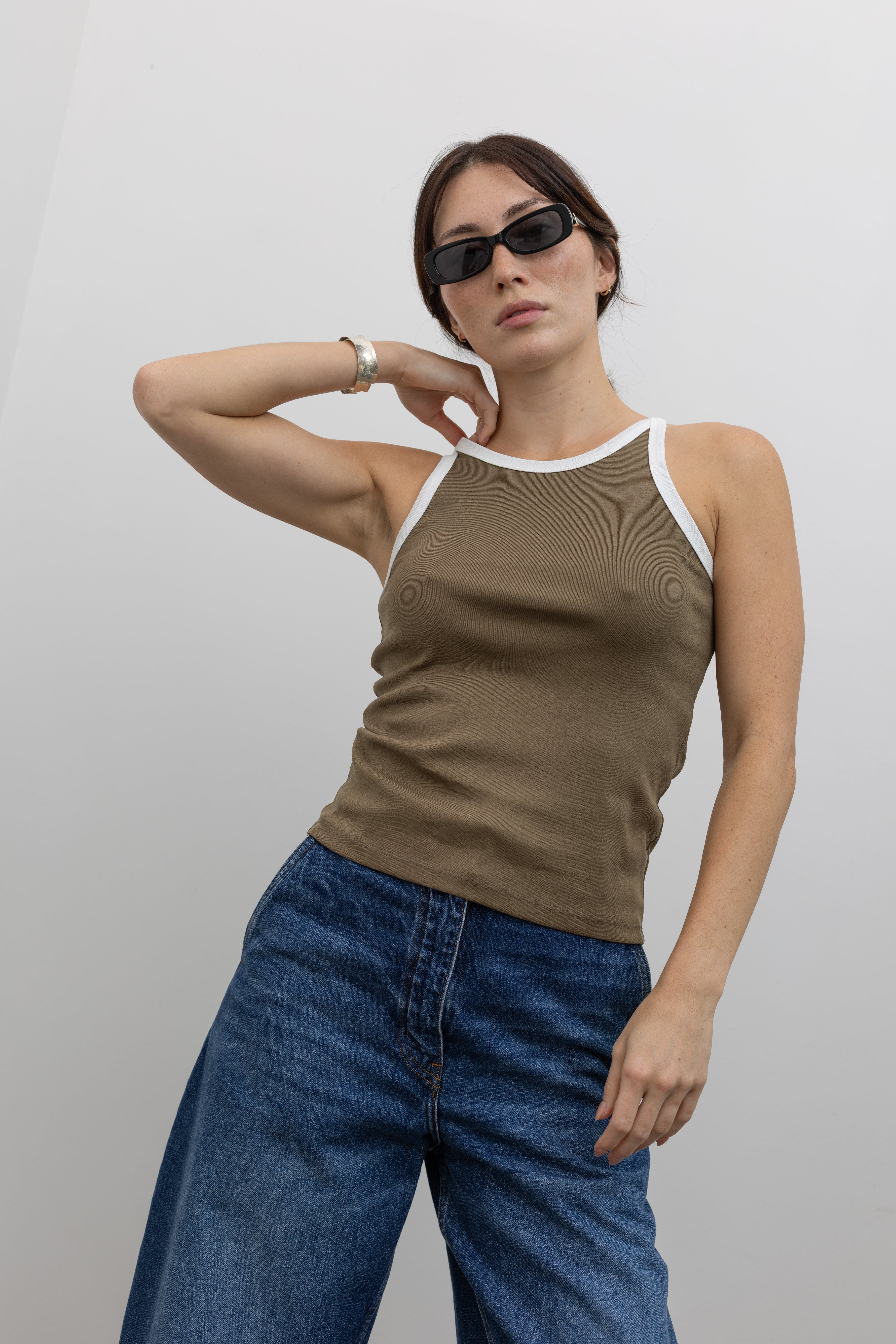 Collective Olive Contrast Trim Rib Tank styled with denim at Alas Eius