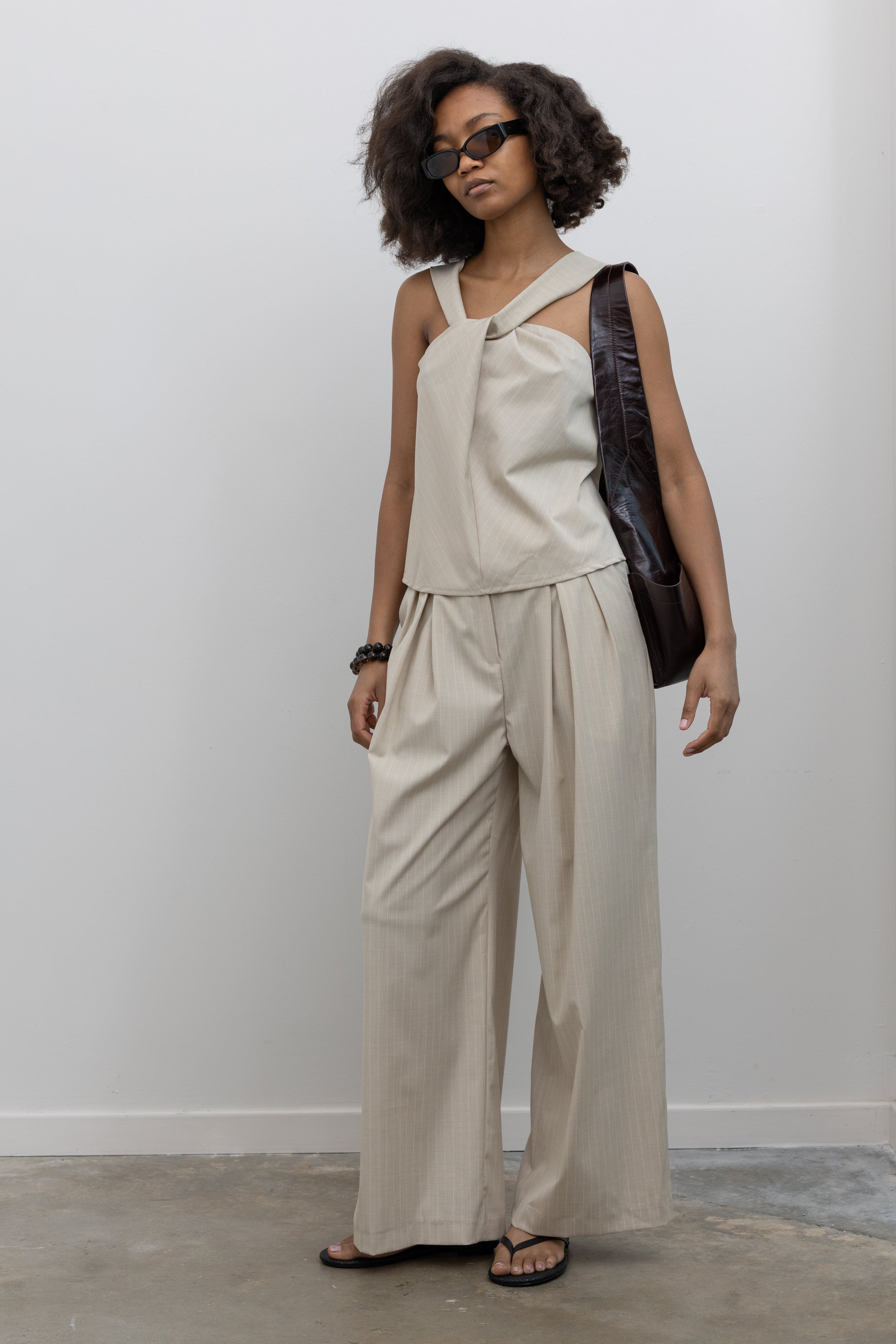 Collective pinstripe wide-leg trousers with contrast elastic waistband and drawstring at Alas Eius