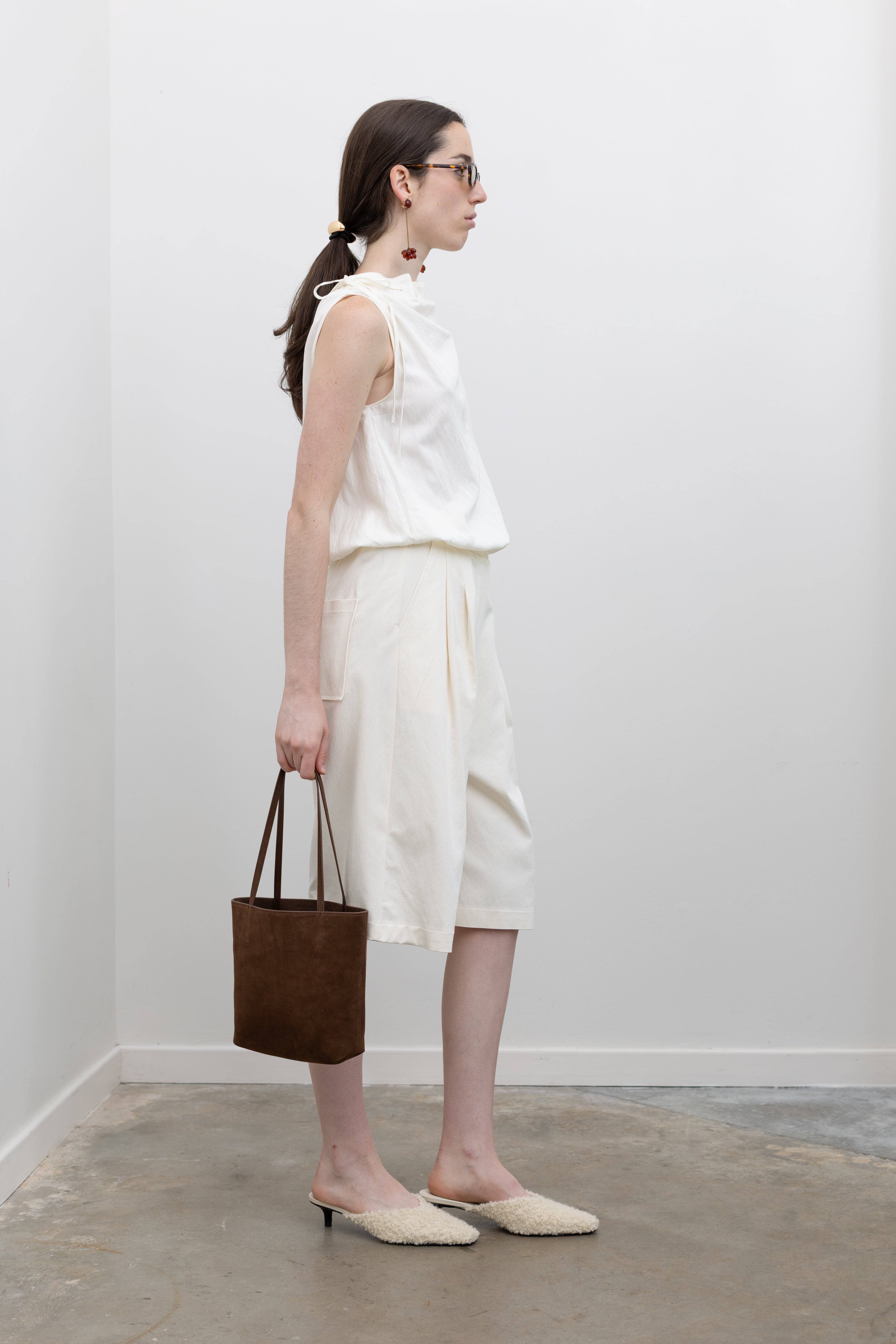 Collective pleated cotton blend shorts offering refined women's resort wear and elevated everyday summer dressing at Alas Eius