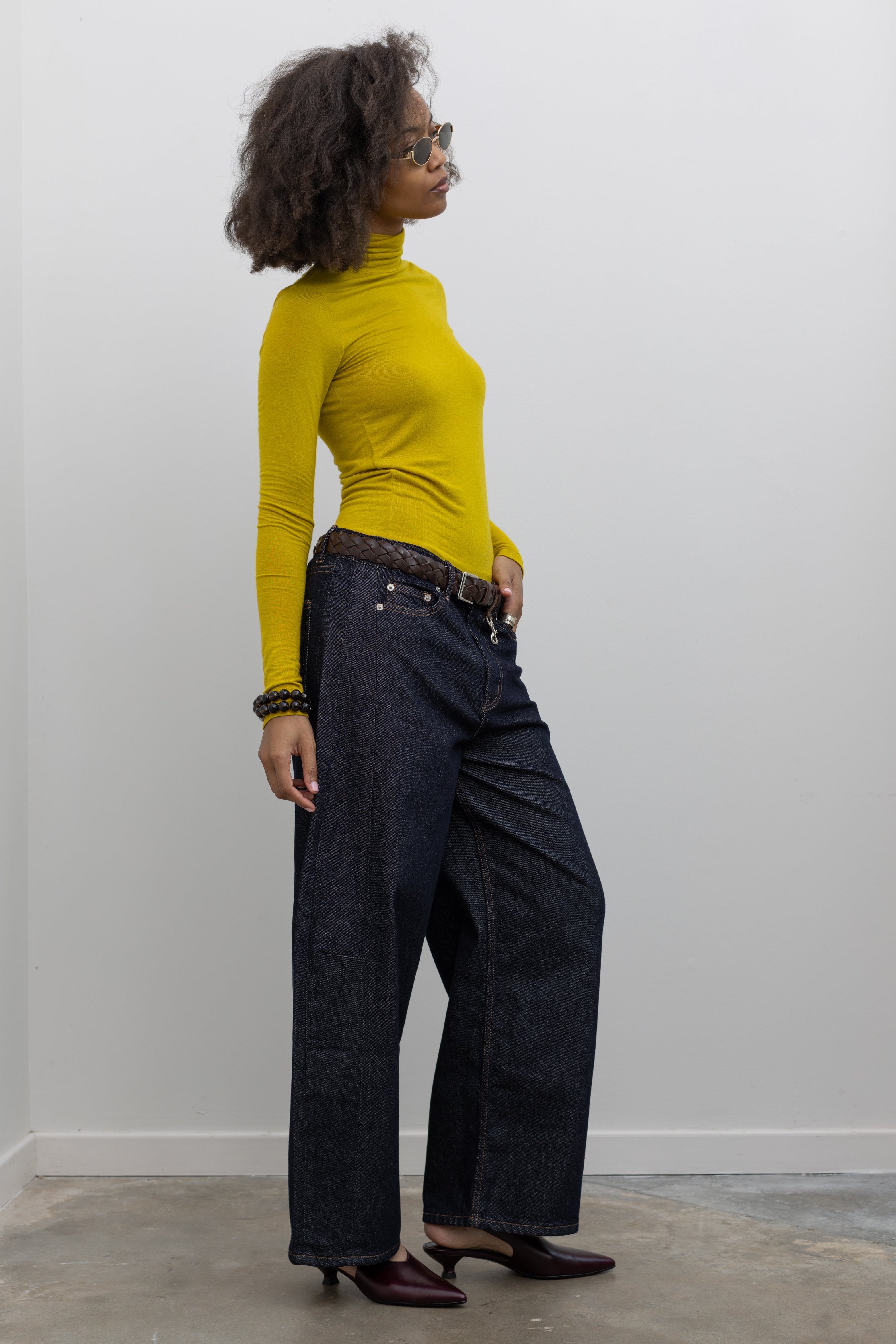 Collective raw dark denim barrel-leg jeans with a relaxed cropped silhouette at Alas Eius