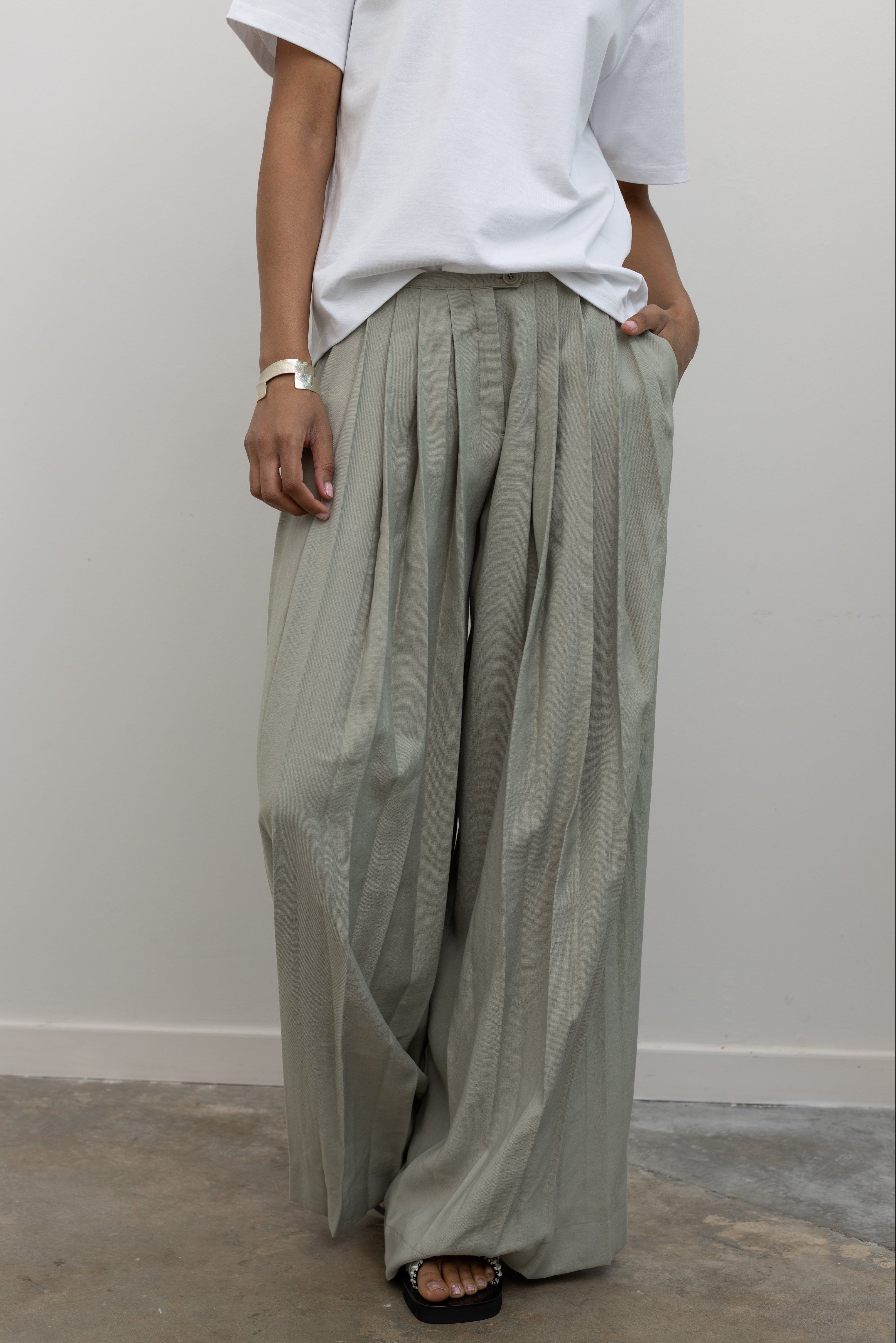 Collective relaxed bamboo blend trousers with oversized wide leg silhouette at Alas Eius