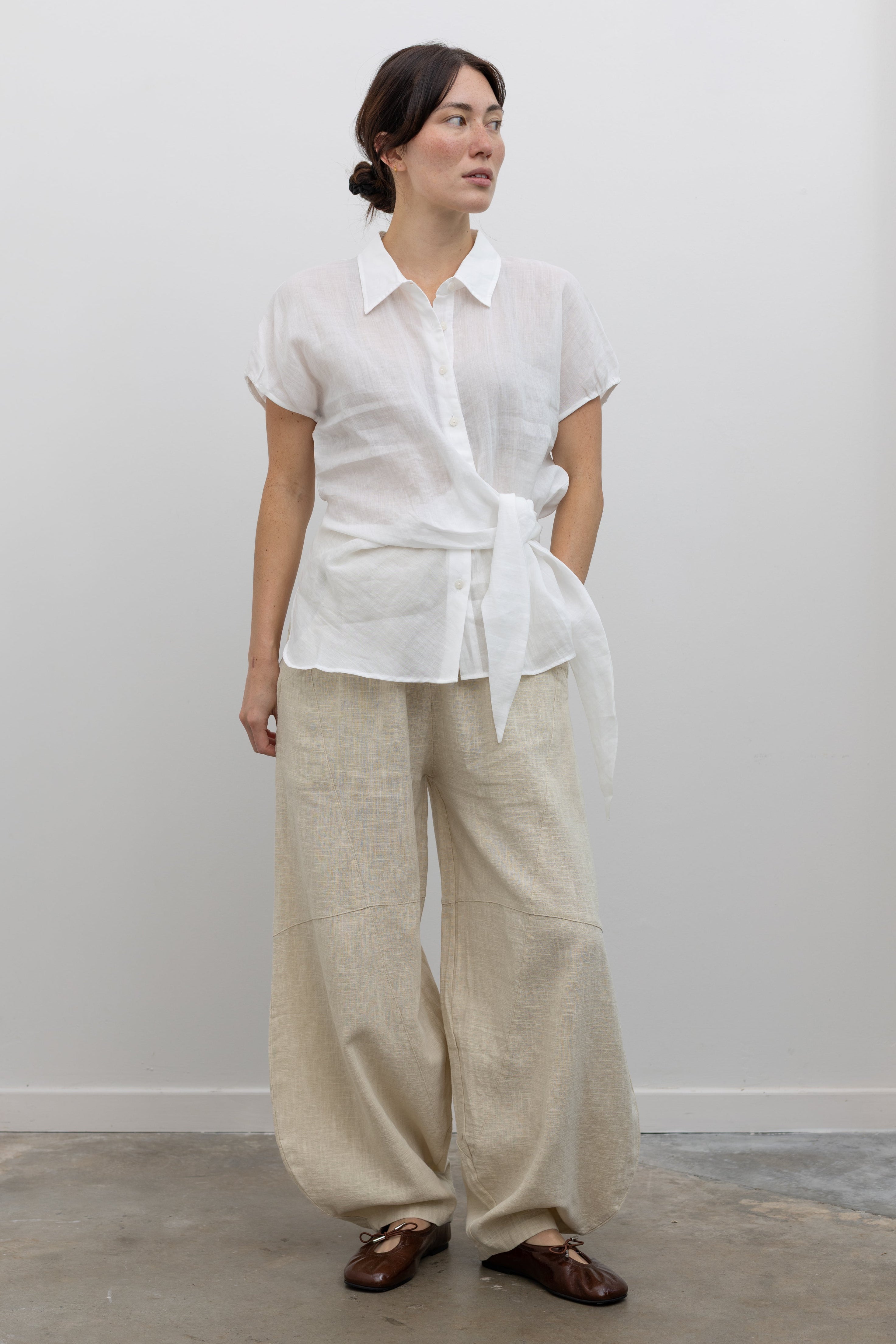Collective relaxed barrel leg cotton linen pants in a modern minimalist silhouette at Alas Eius
