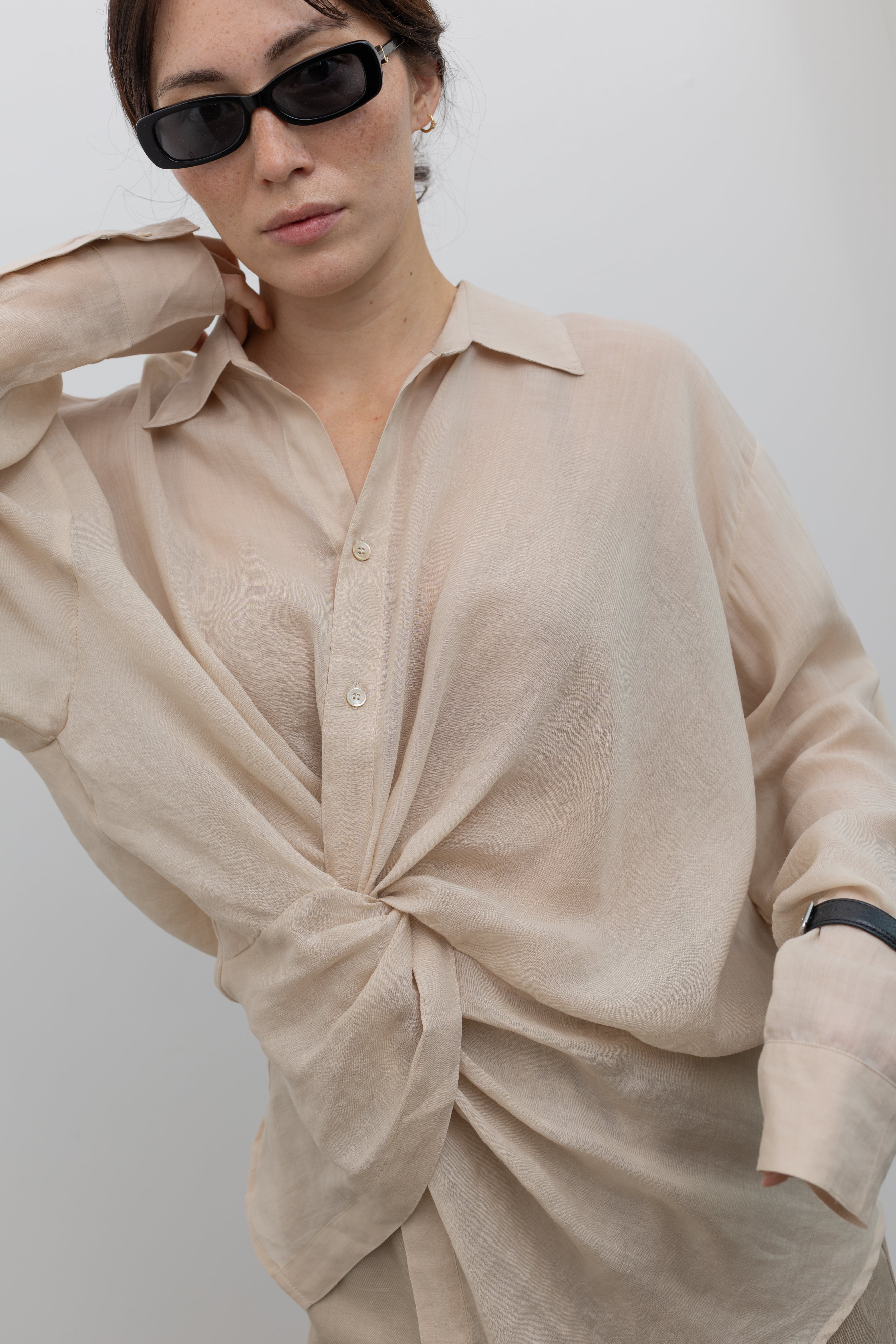 Collective oversized collared shirt with fluid asymmetric drape and relaxed fit at Alas Eius