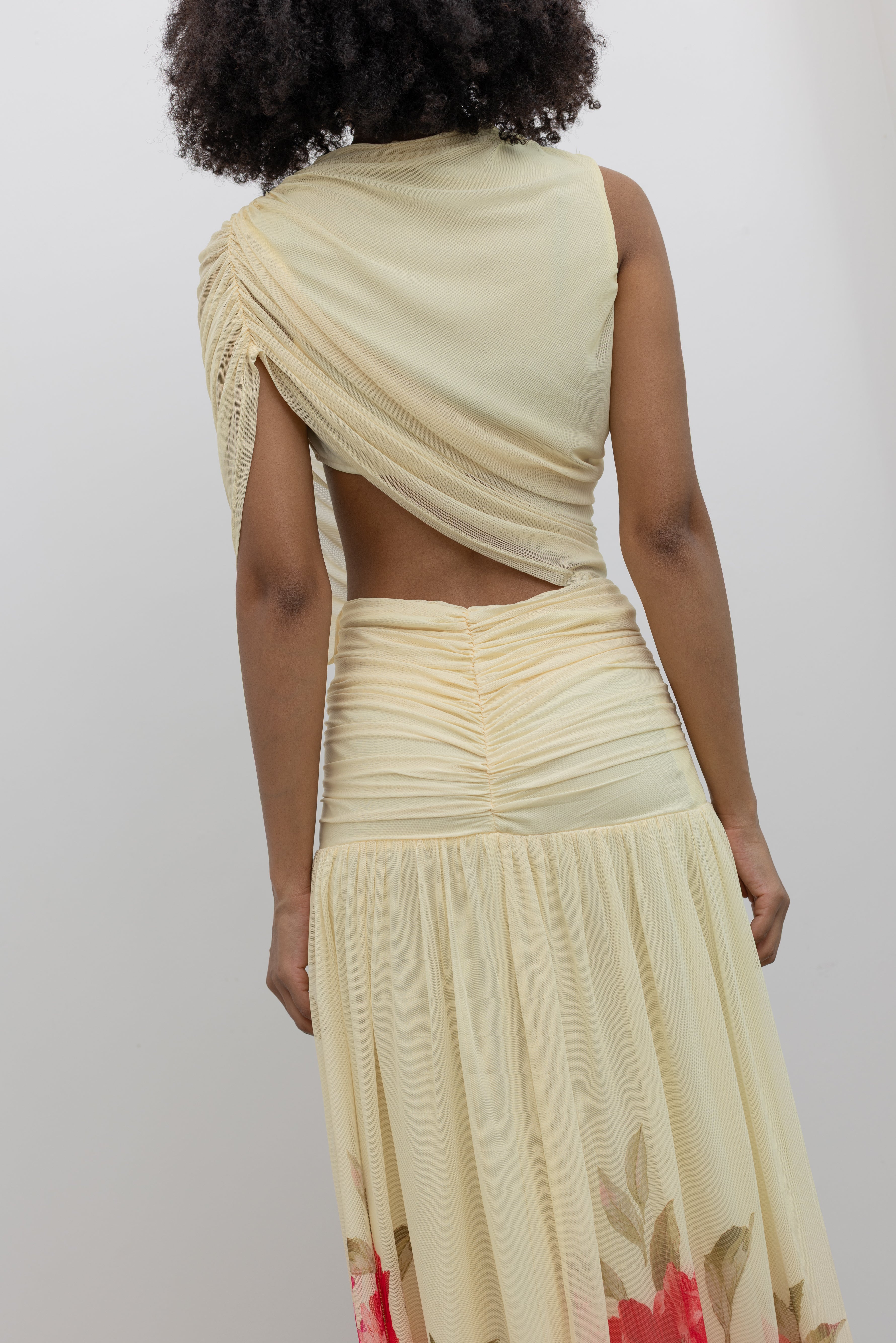 Collective romantic maxi dress with soft gathered waist and oversized floral hem at Alas Eius