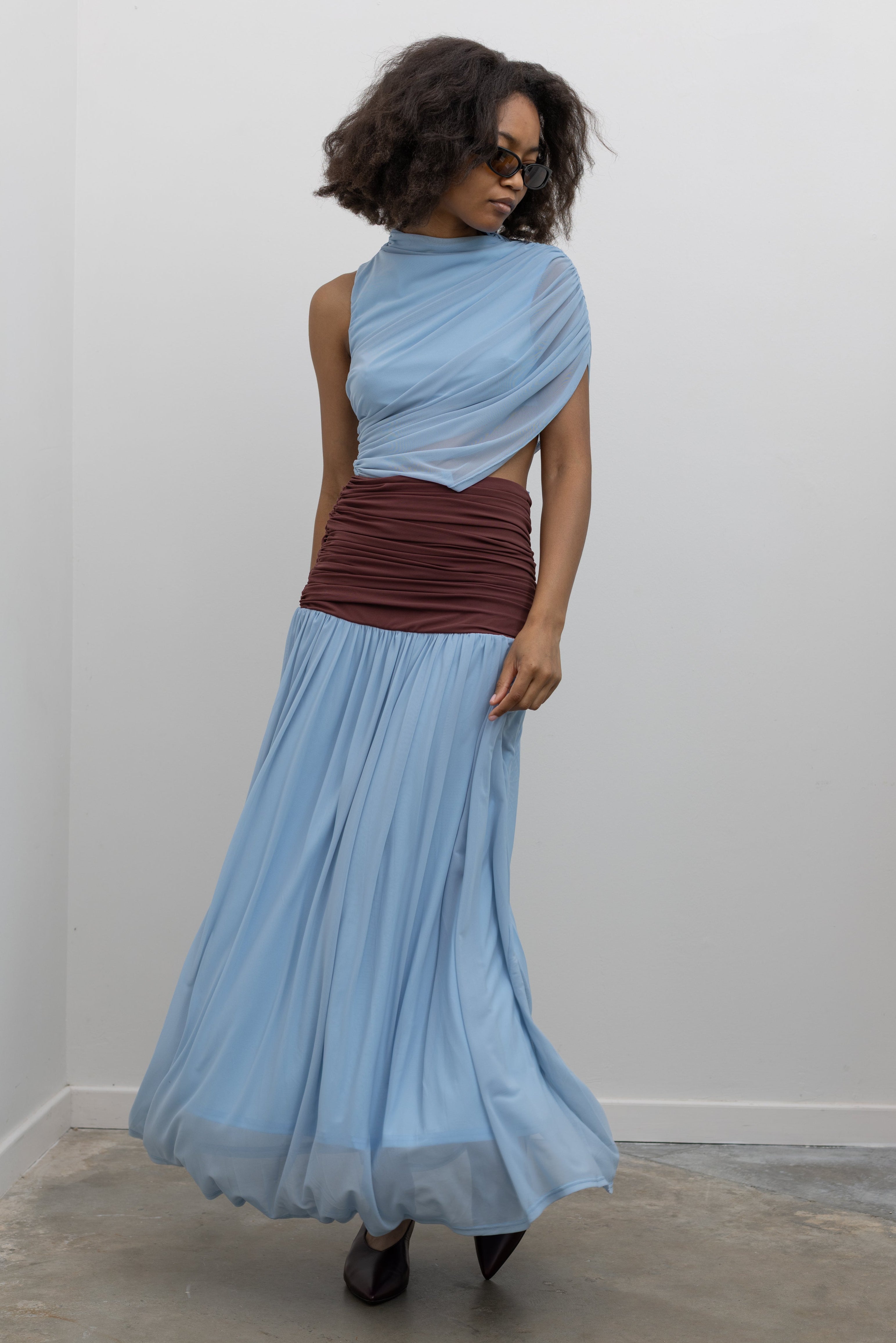 Collective stretch-mesh maxi dress with powder-blue bodice, ruched waistband, and pleated skirt at Alas Eius