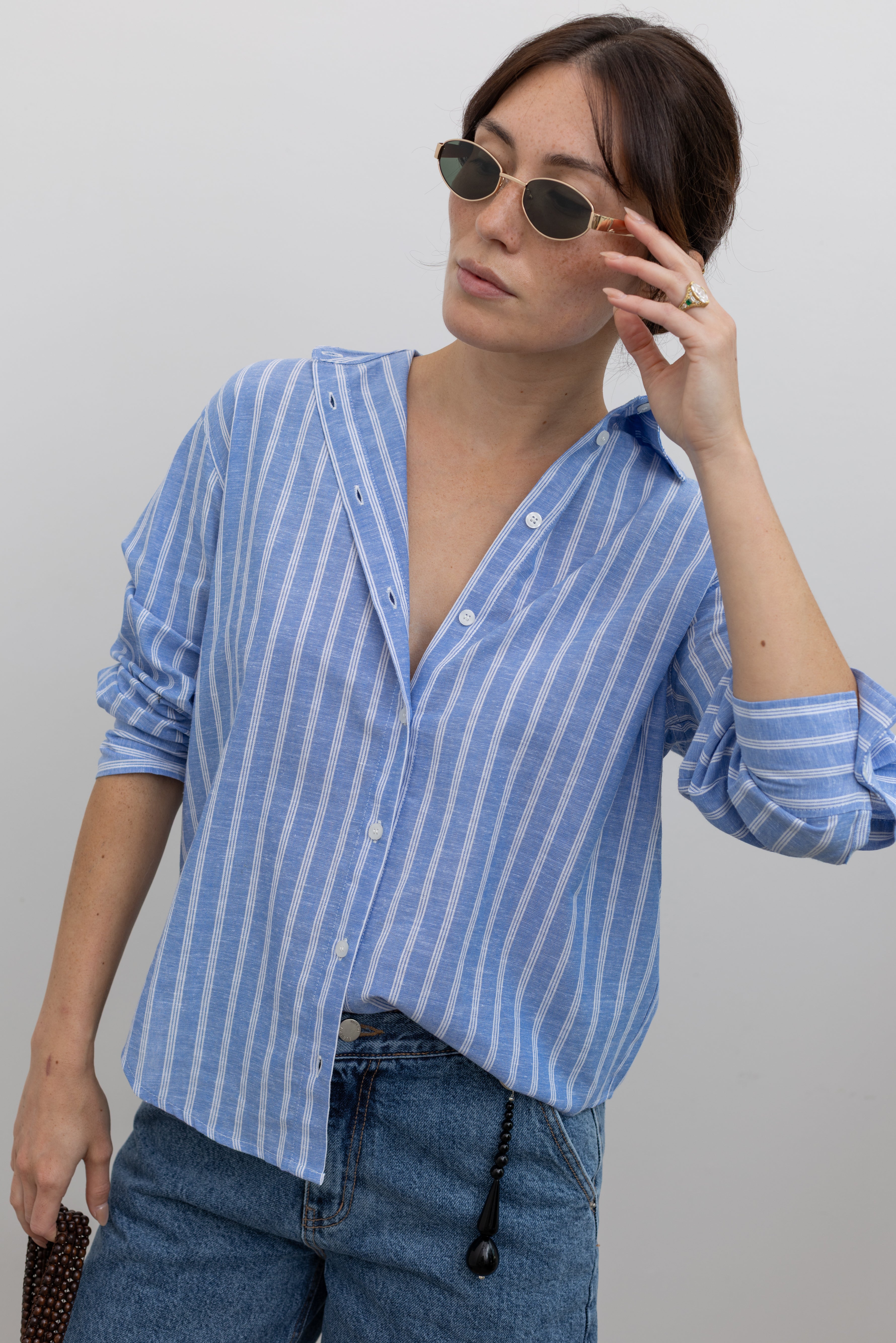 Collective striped cotton-linen button-down shirt with a relaxed fit and classic collar at Alas Eius