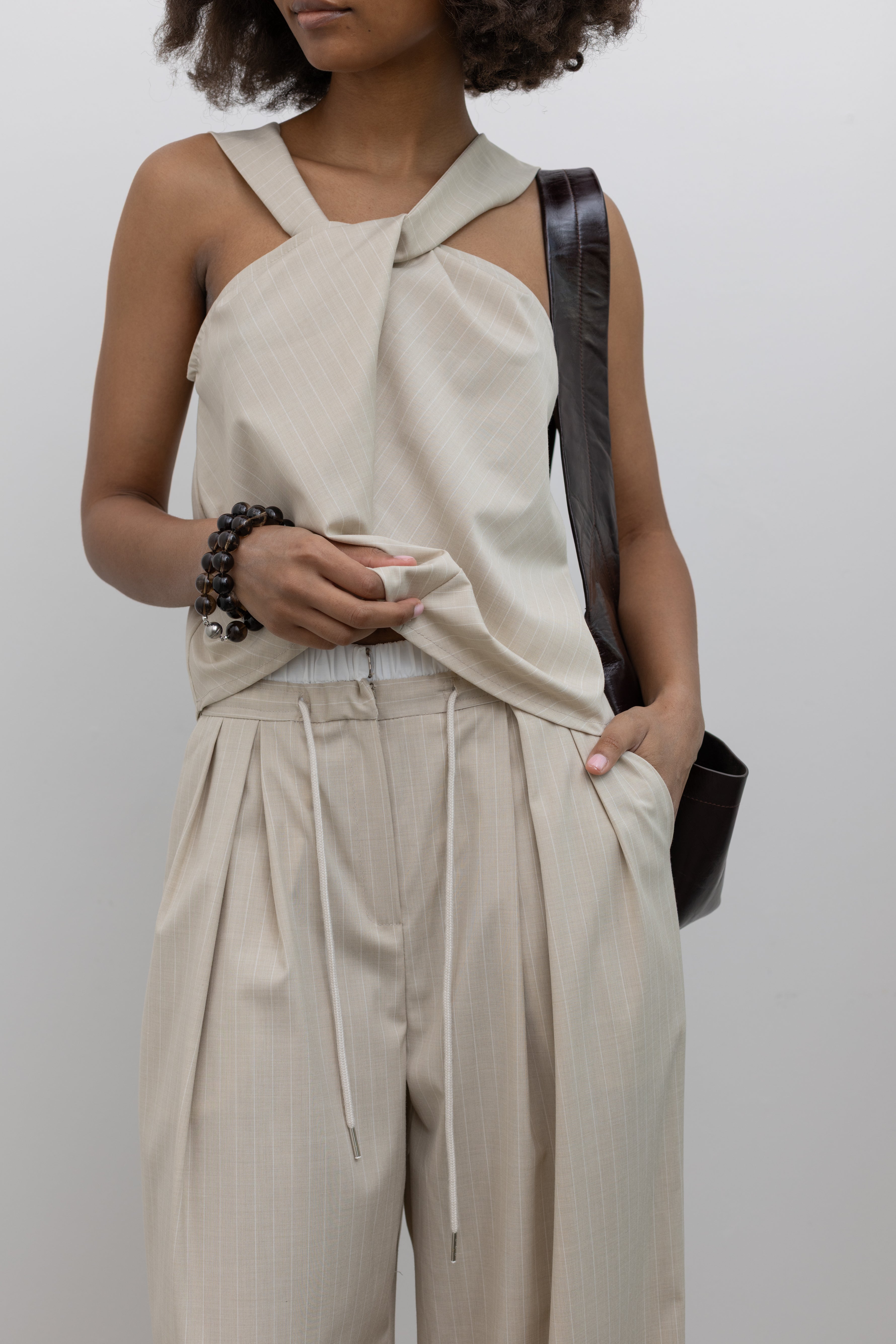 Collective tailored pinstripe wide-leg pants with front pleats at Alas Eius
