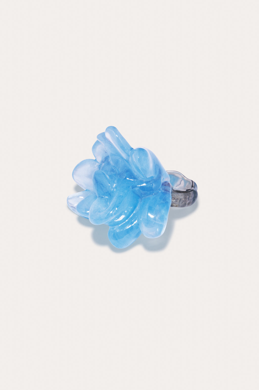 Completed Works Floe recycled sterling silver ring featuring a bold blue resin accent and organic sculptural form at Alas Eius