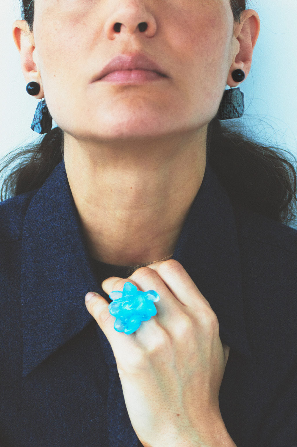 Completed Works handcrafted blue resin and recycled sterling silver Floe ring with an expressive minimalist design at Alas Eius