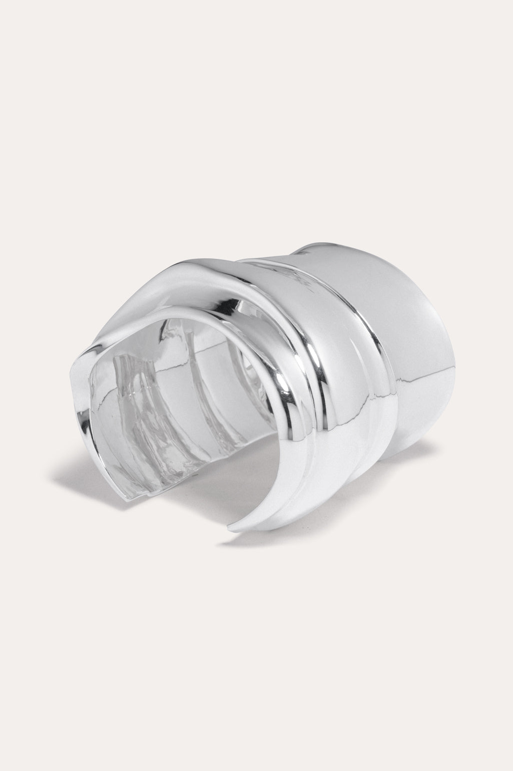 Completed Works bold silver plated cuff crafted from recycled sterling silver with a modern minimalist profile at Alas Eius