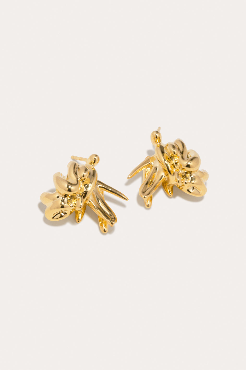 Completed Works Notsobig General Strike earrings featuring 18ct yellow gold plated recycled brass with a refined sculptural design at Alas Eius