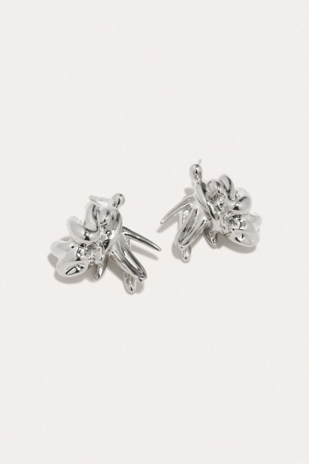 Completed Works Notsobig General Strike earrings featuring recycled brass plated in silver with a refined minimalist design at Alas Eius