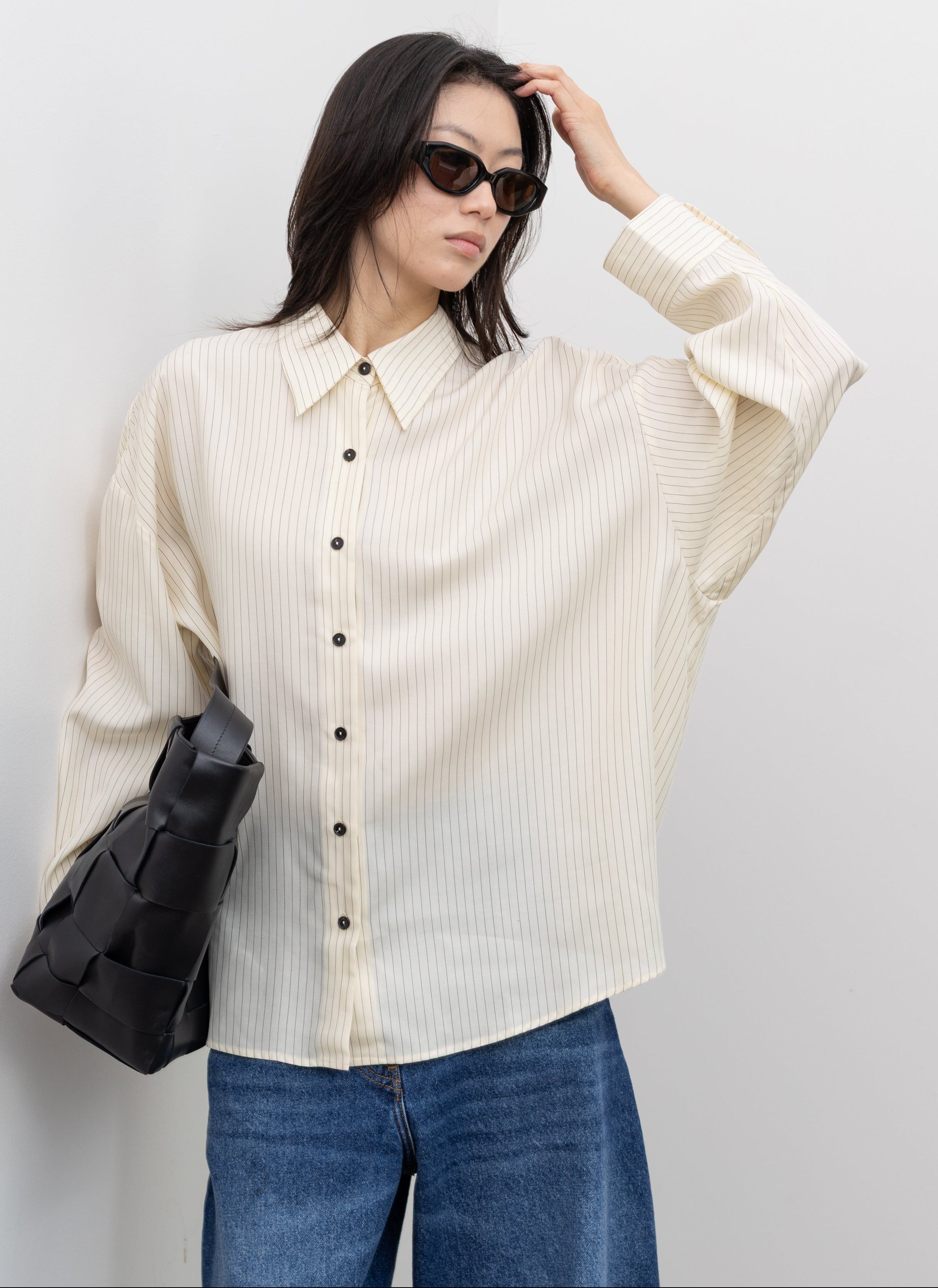 Cordera oversized pencil stripe shirt styled as a relaxed women's button-down top with effortless minimalist fashion appeal at Alas Eius