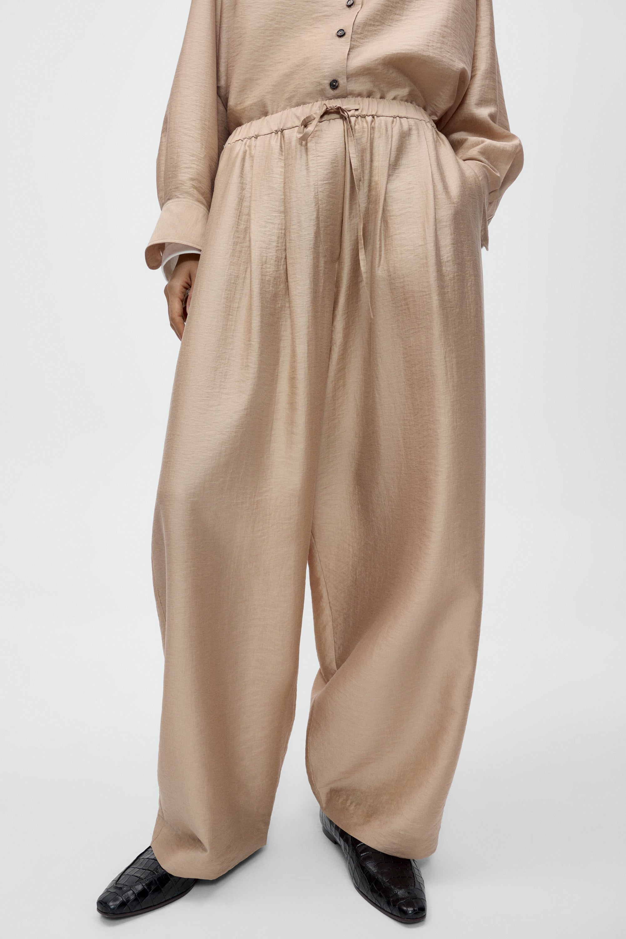 Cordera oversized wide leg pants with effortless silhouette at Alas Eius