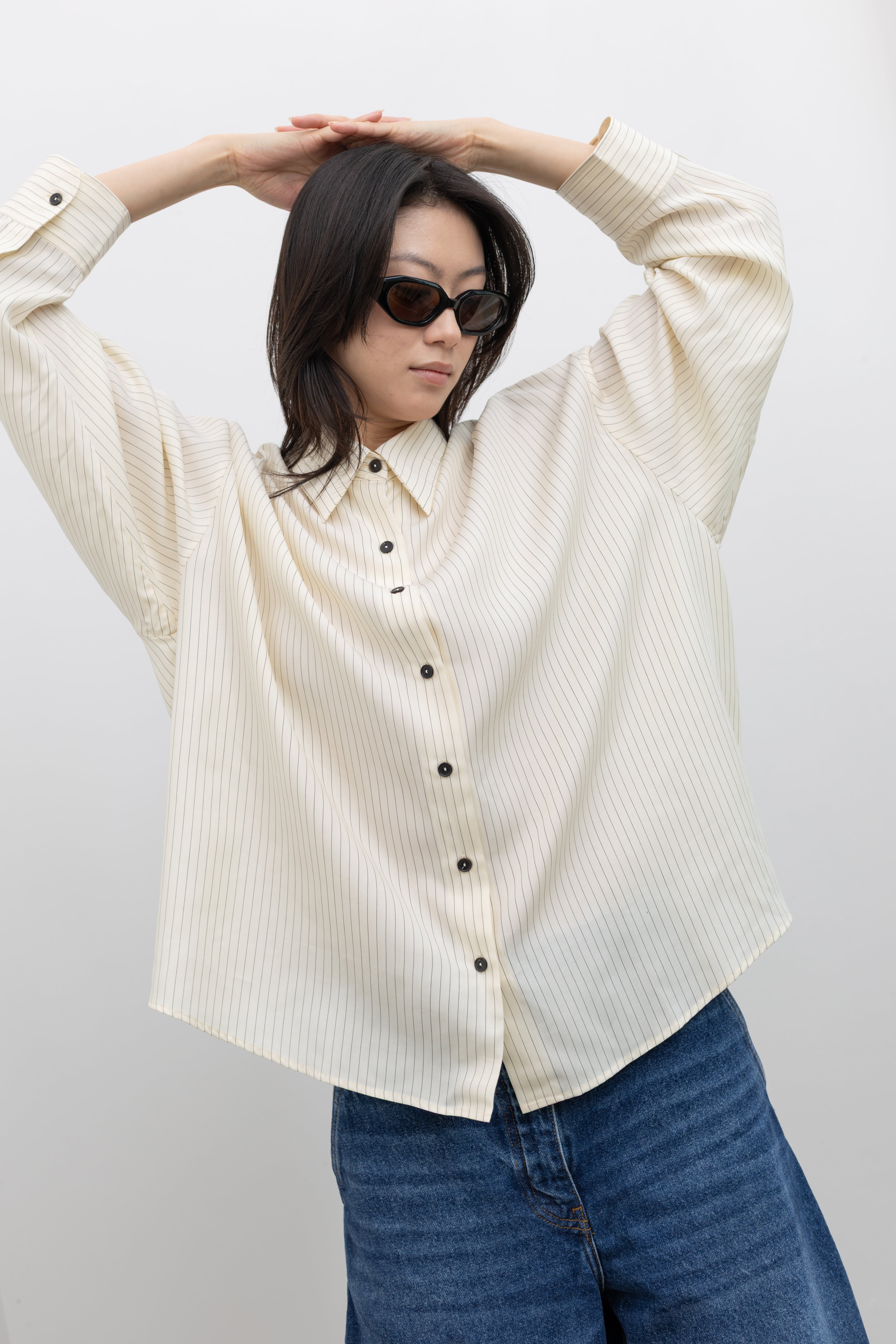 Cordera pencil stripe shirt with an oversized fit, perfect for contemporary women's wardrobe essentials at Alas Eius
