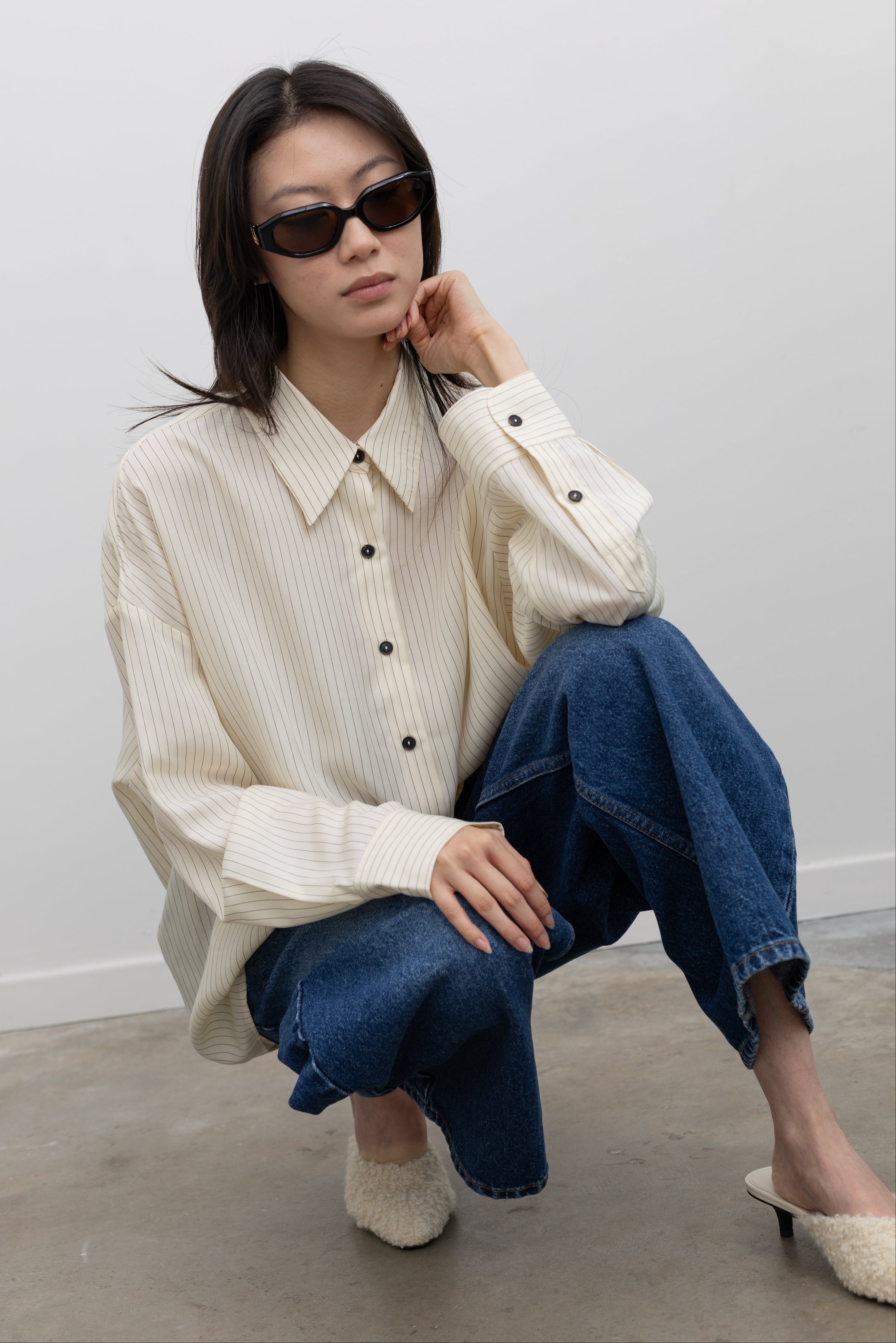 Cordera striped shirt with an effortless oversized silhouette inspired by timeless women's capsule wardrobe style at Alas Eius
