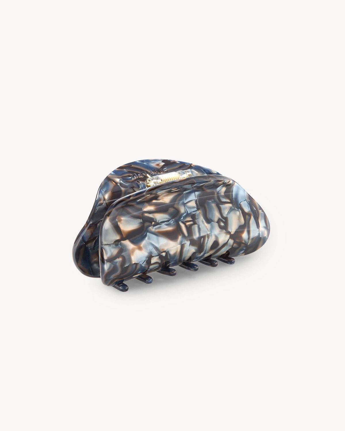 Machete Crescent Claw Blue Horn hair claw with sculptural curved design at Alas Eius