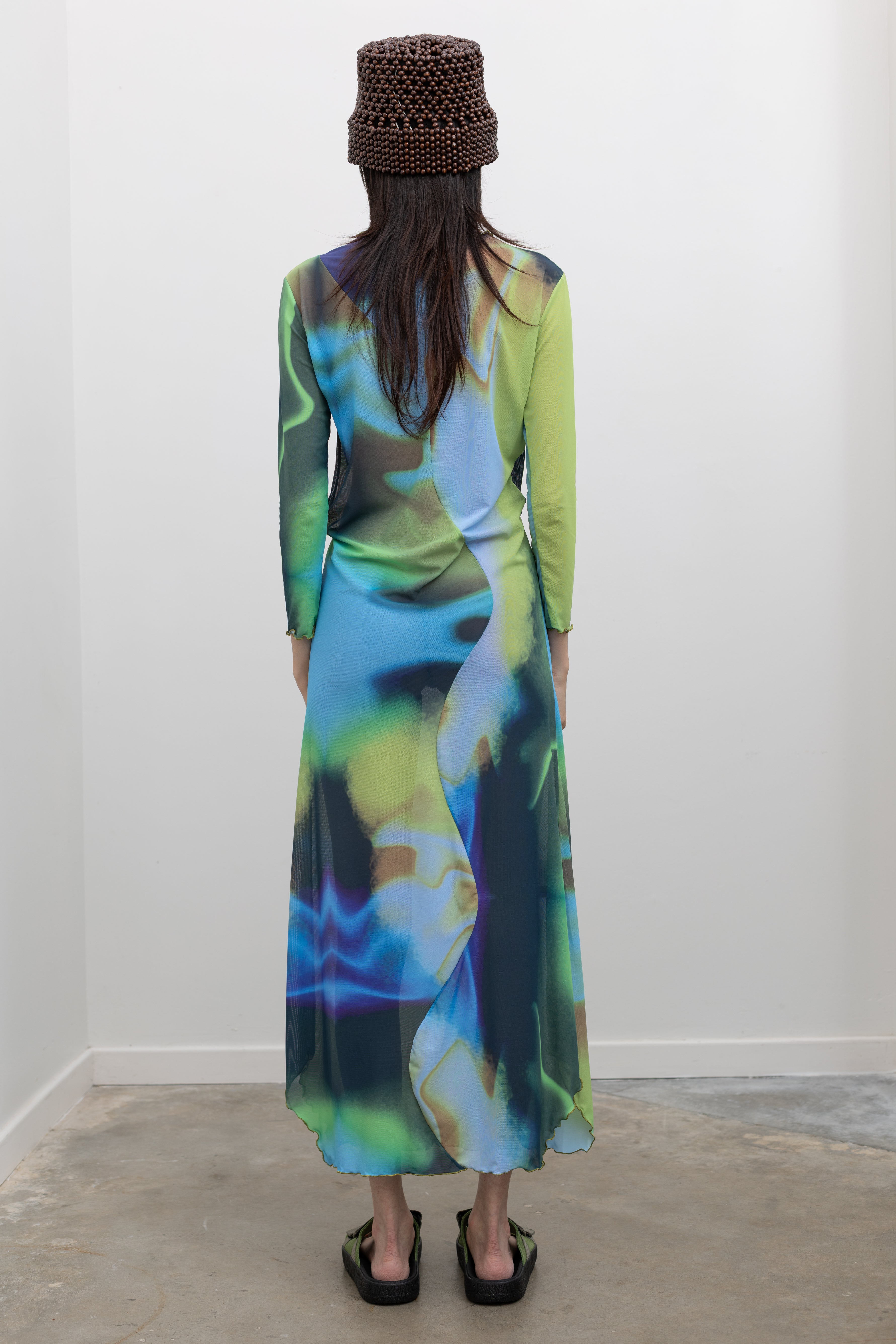 Nin Studio Openfield Swirl Dress designed with a sleek second-skin fit, delicate lettuce hem, and contemporary silhouette, perfect for elevated women's wardrobe styling at Alas Eius