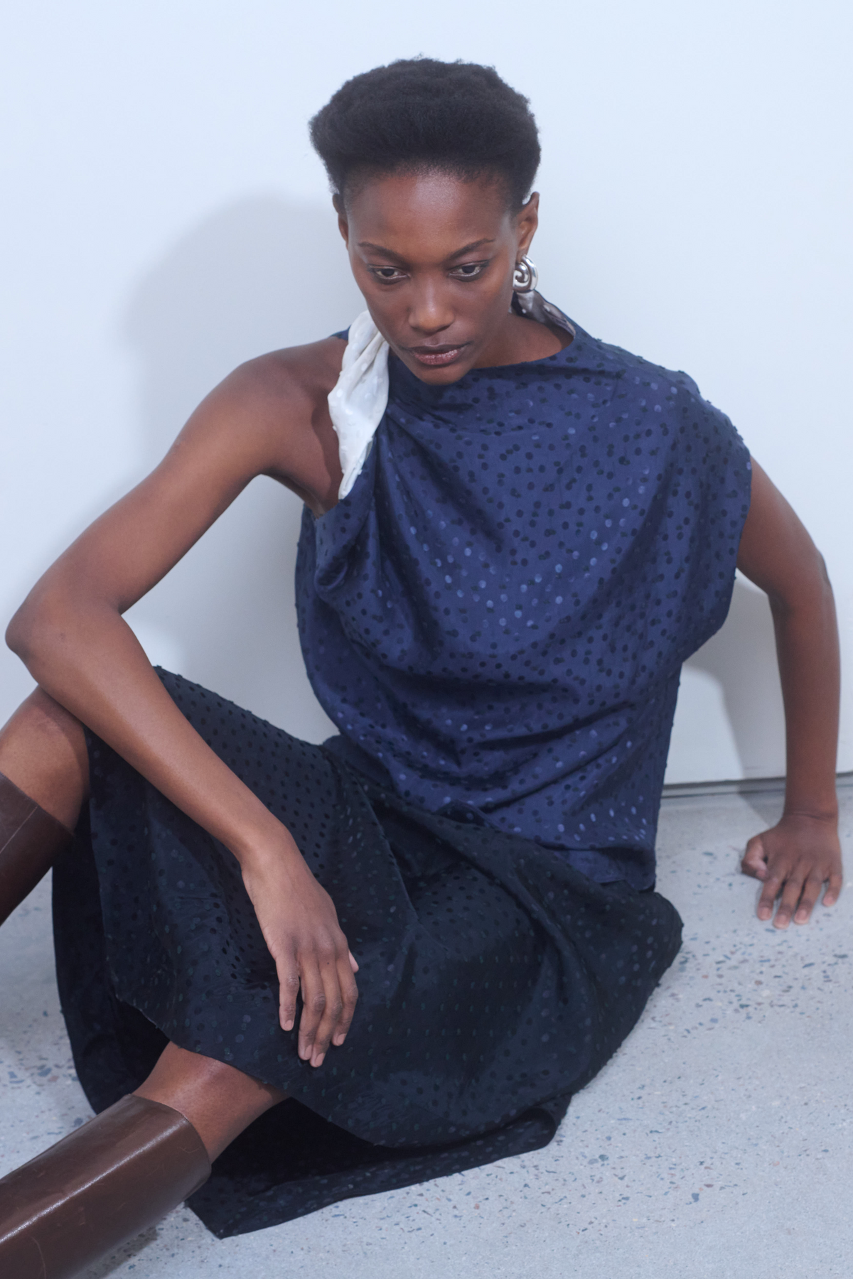 Nomia Polka Dot Satin Twist Shoulder Top at Alas Eius