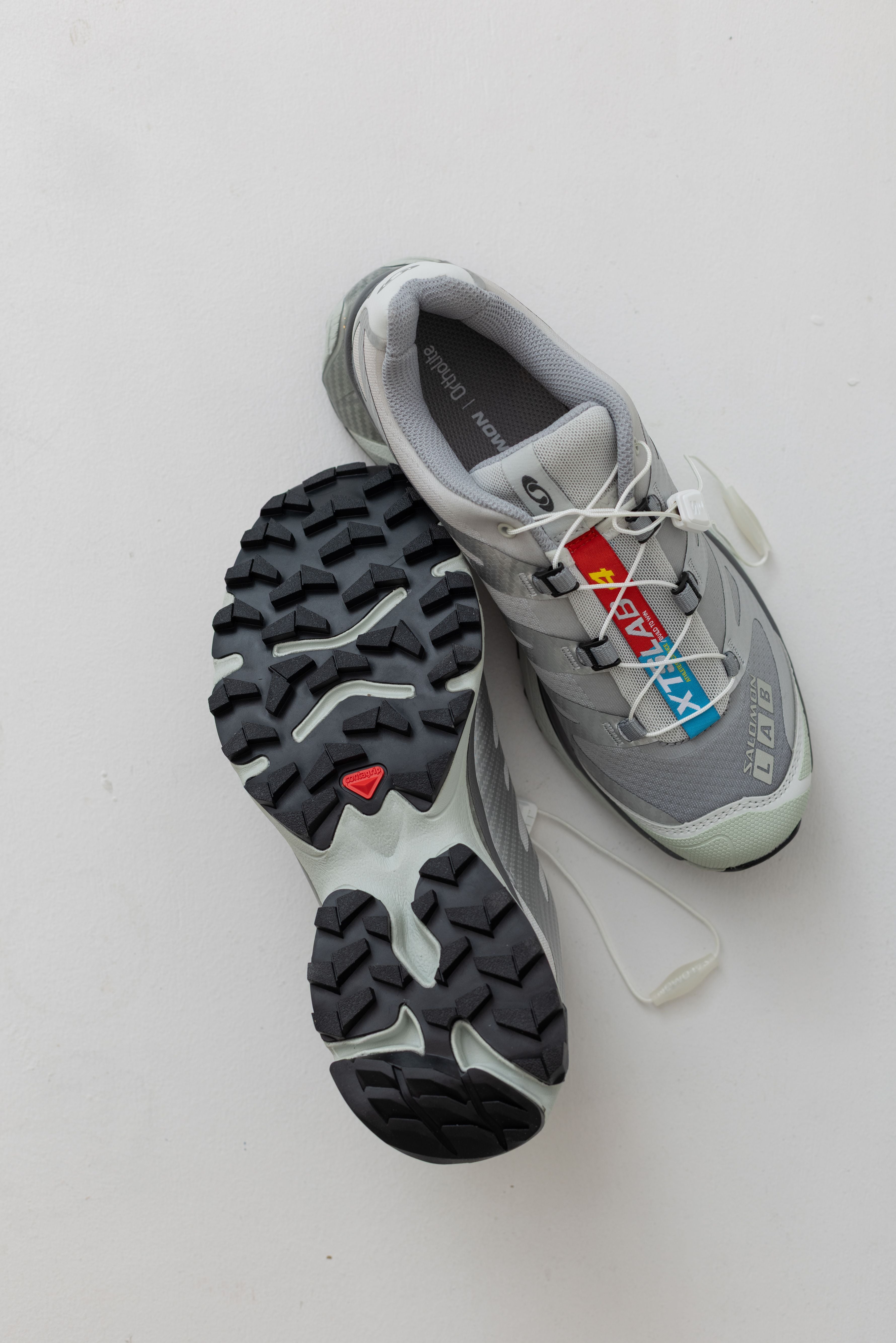 Salomon XT-4 OG sneakers in White Ebony and Lunar Rock at Alas Eius