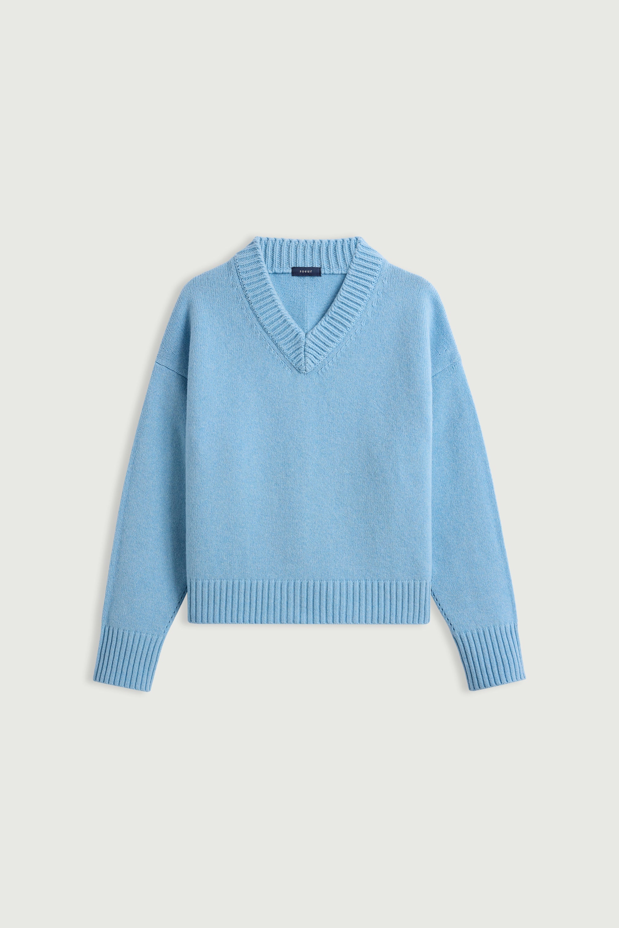 Soeur Julie 100% merino wool pullover with modern chunky ribbed V-neck at Alas Eius