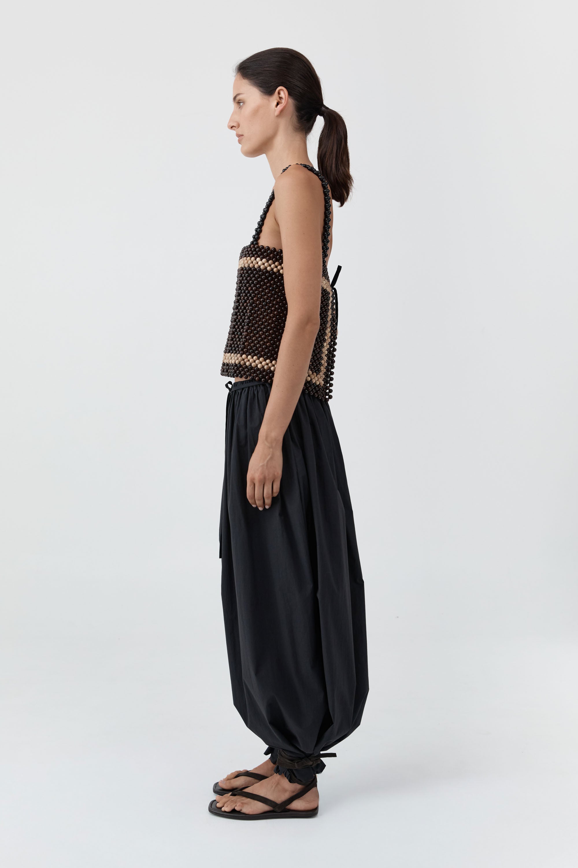 St. Agni contemporary sleeveless top with artisanal bead detailing at Alas Eius