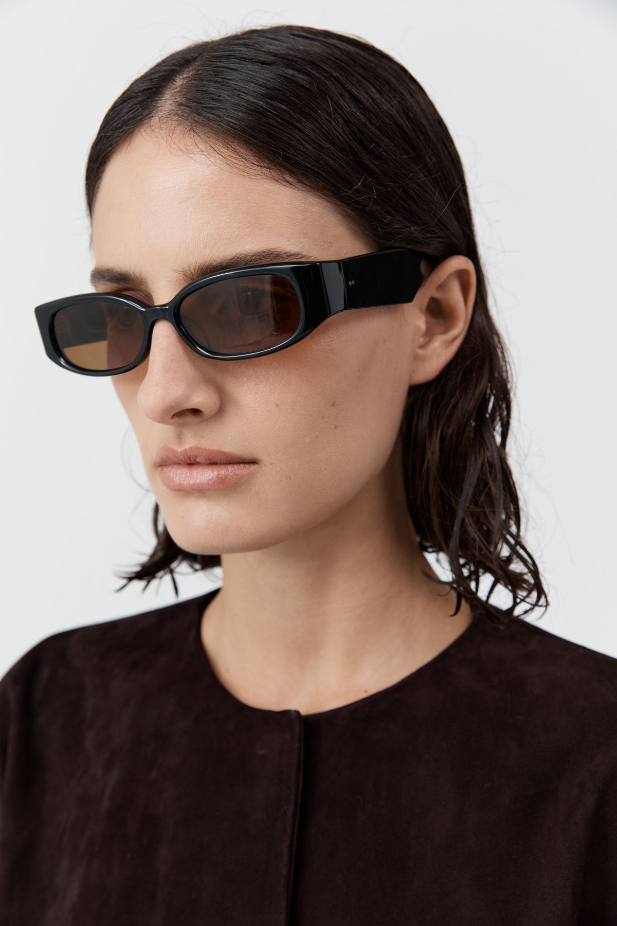 St. Agni Clasico Sunglasses featuring slim fin-shaped temples and silver hardware, designer minimalist sunglasses at Alas Eius