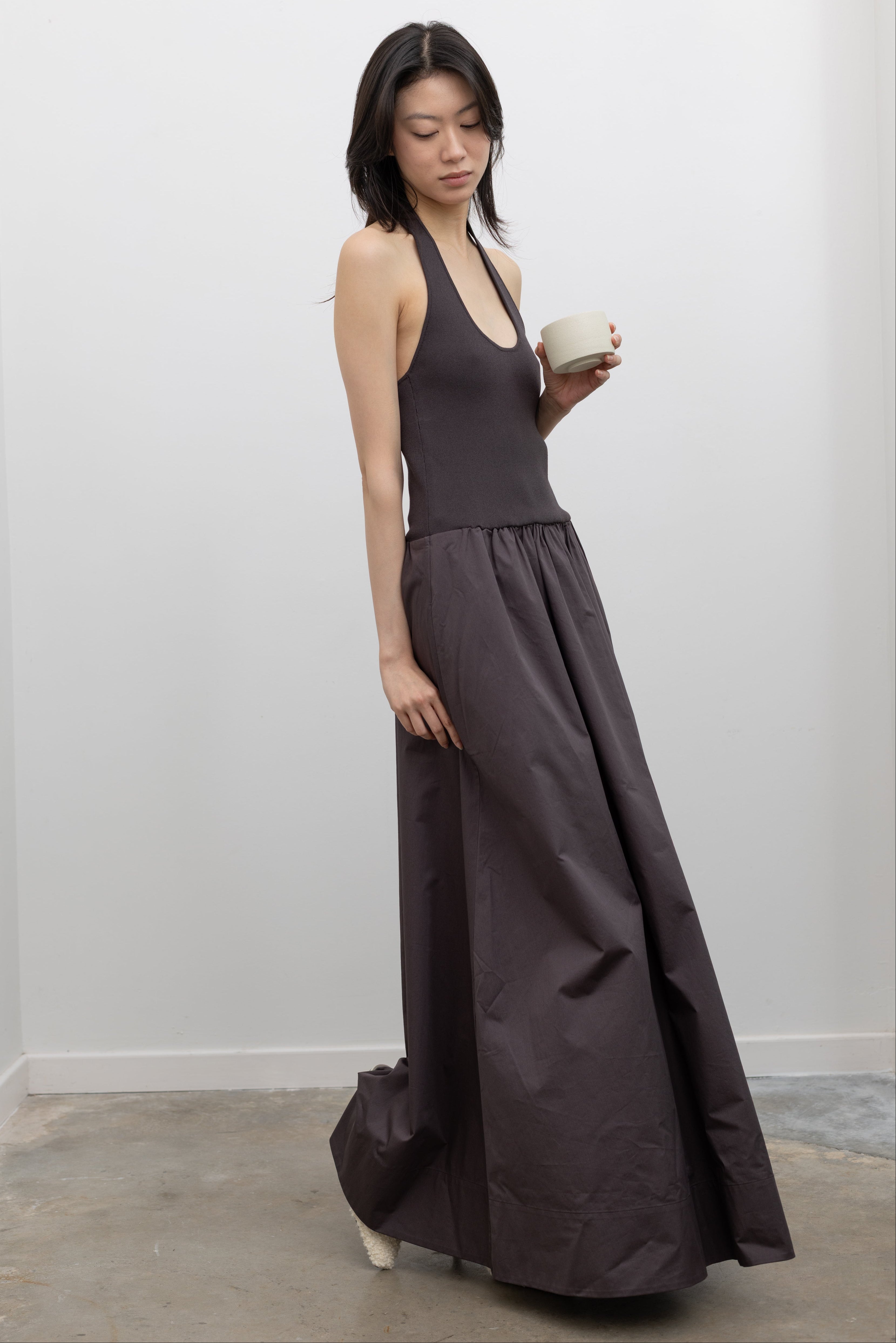 St. Agni Halter Gathered Dress showcasing a fluid silhouette with a fitted bodice and full-length skirt at Alas Eius.
