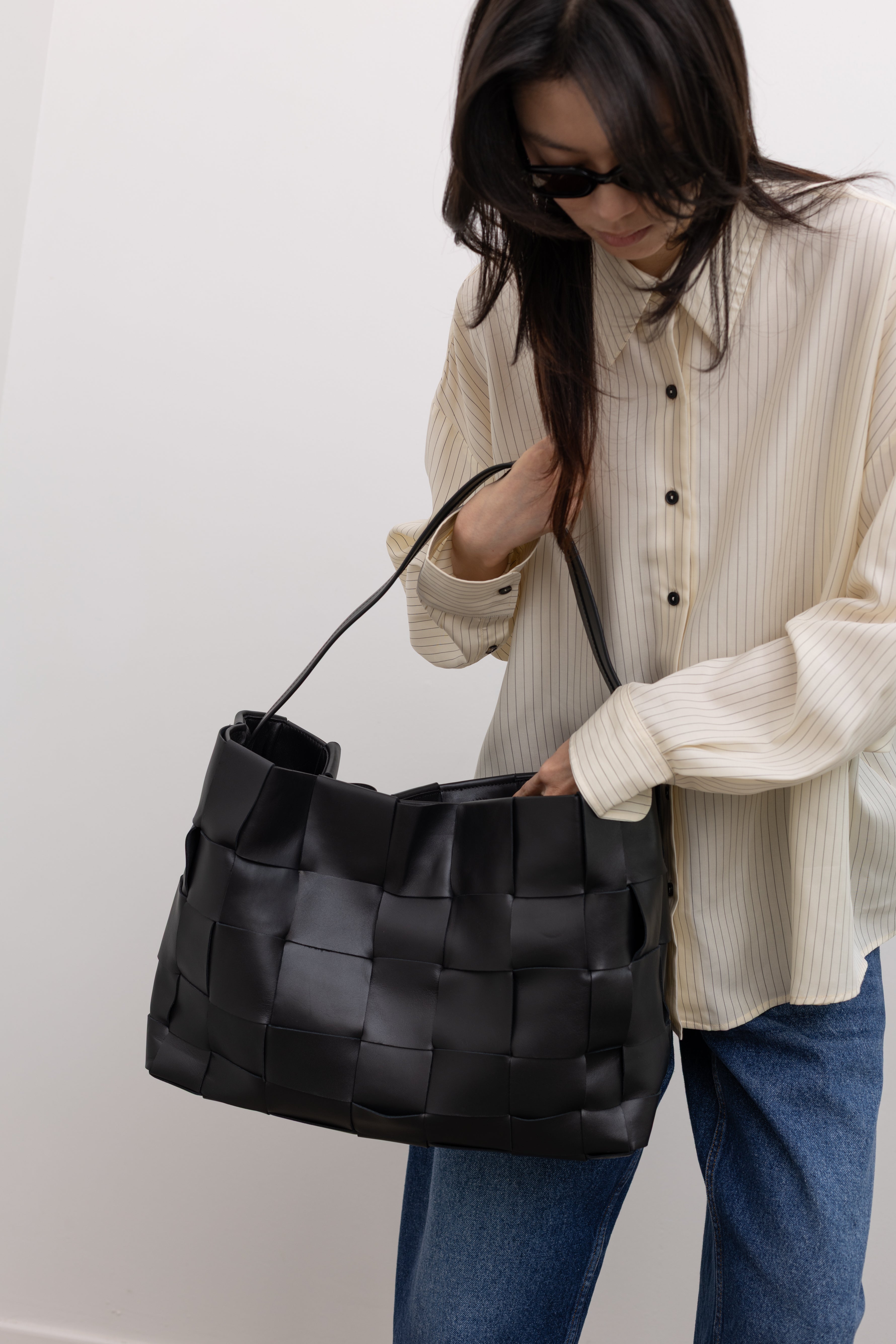St. Agni large woven tote designed as an elevated women's designer handbag for work and weekend wear at Alas Eius