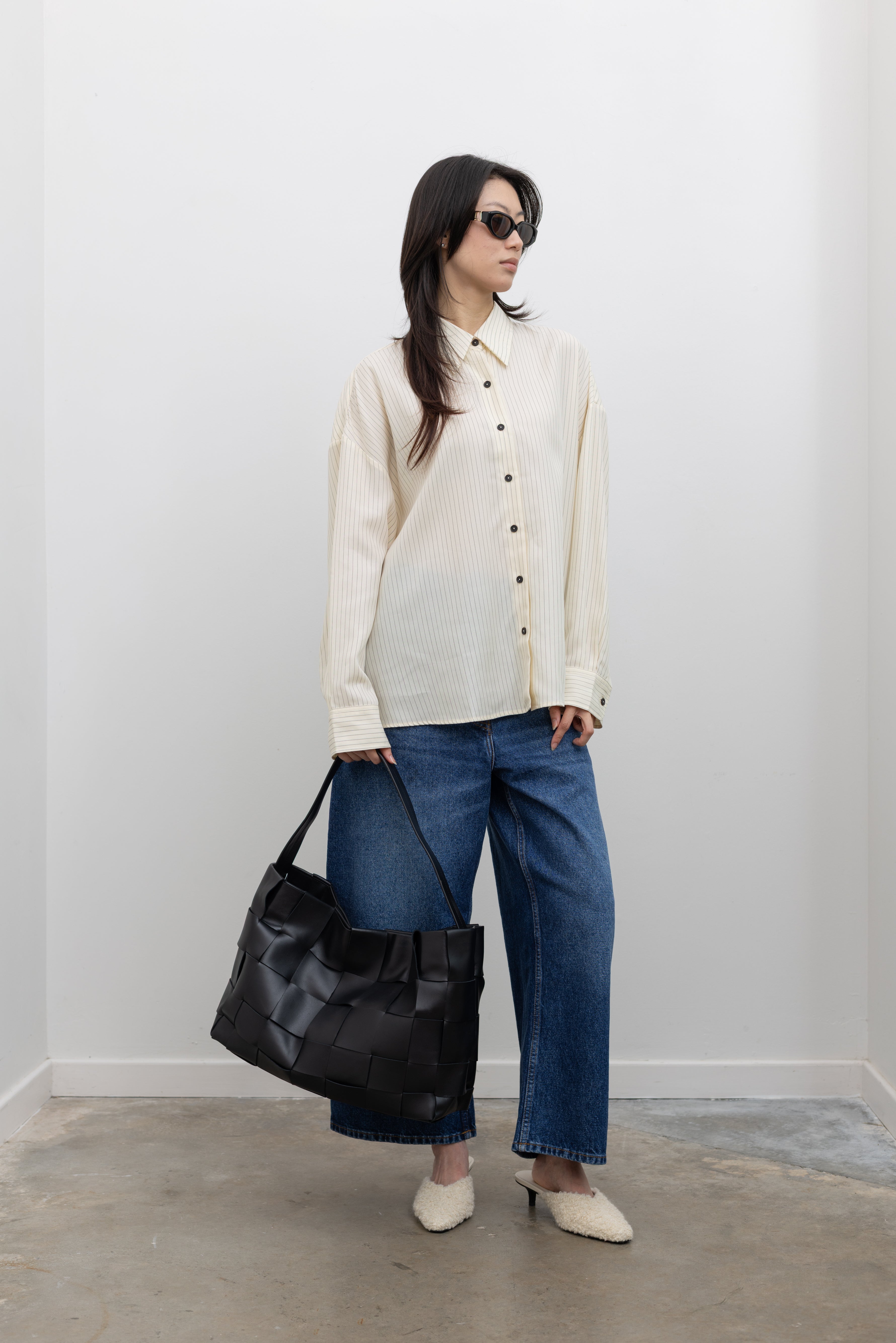 St. Agni oversized woven tote bag showcasing timeless women's luxury accessories and effortless style at Alas Eius