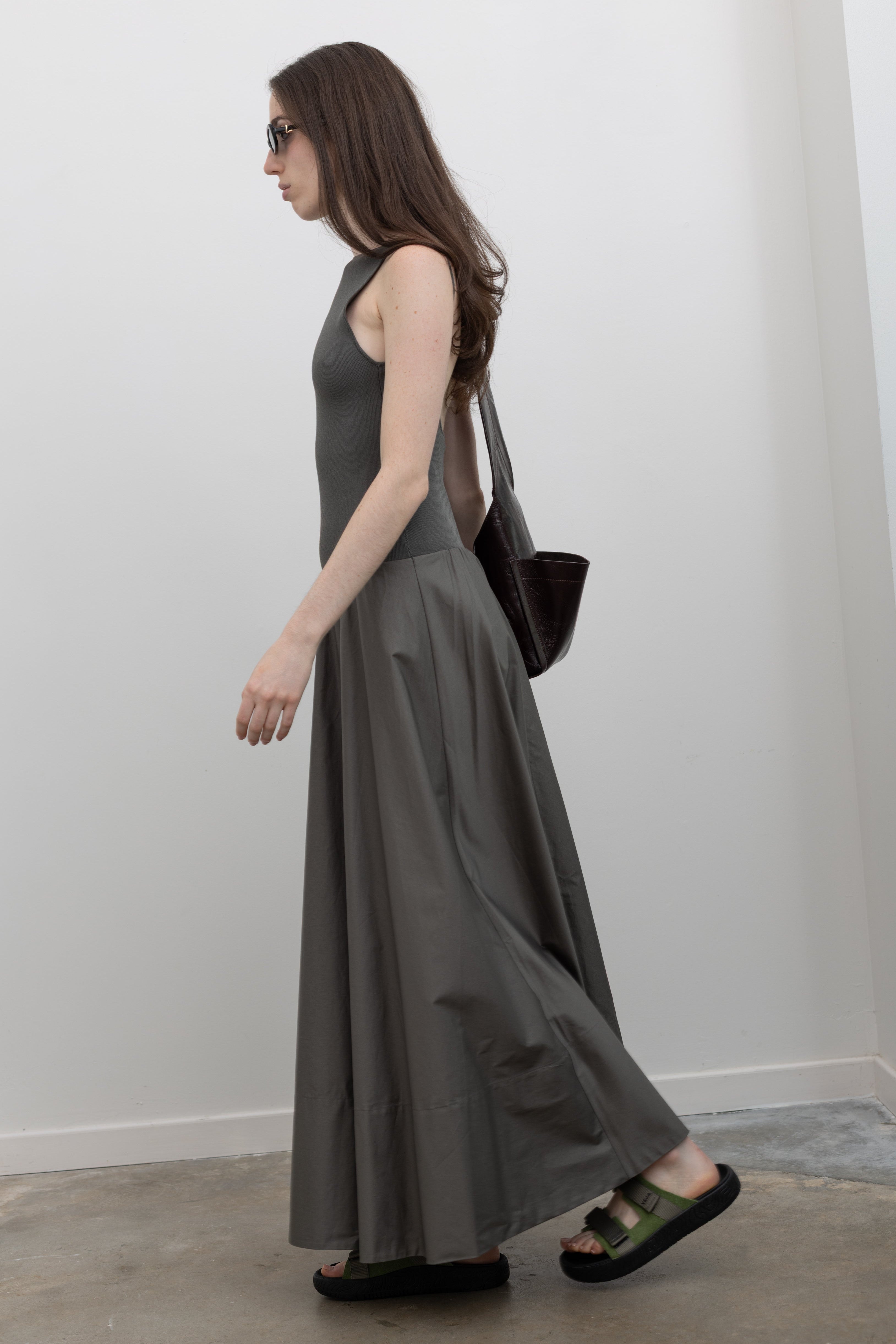 St. Agni sleeveless maxi dress featuring a square neckline, gathered waist, and flowing poplin skirt at Alas Eius. 