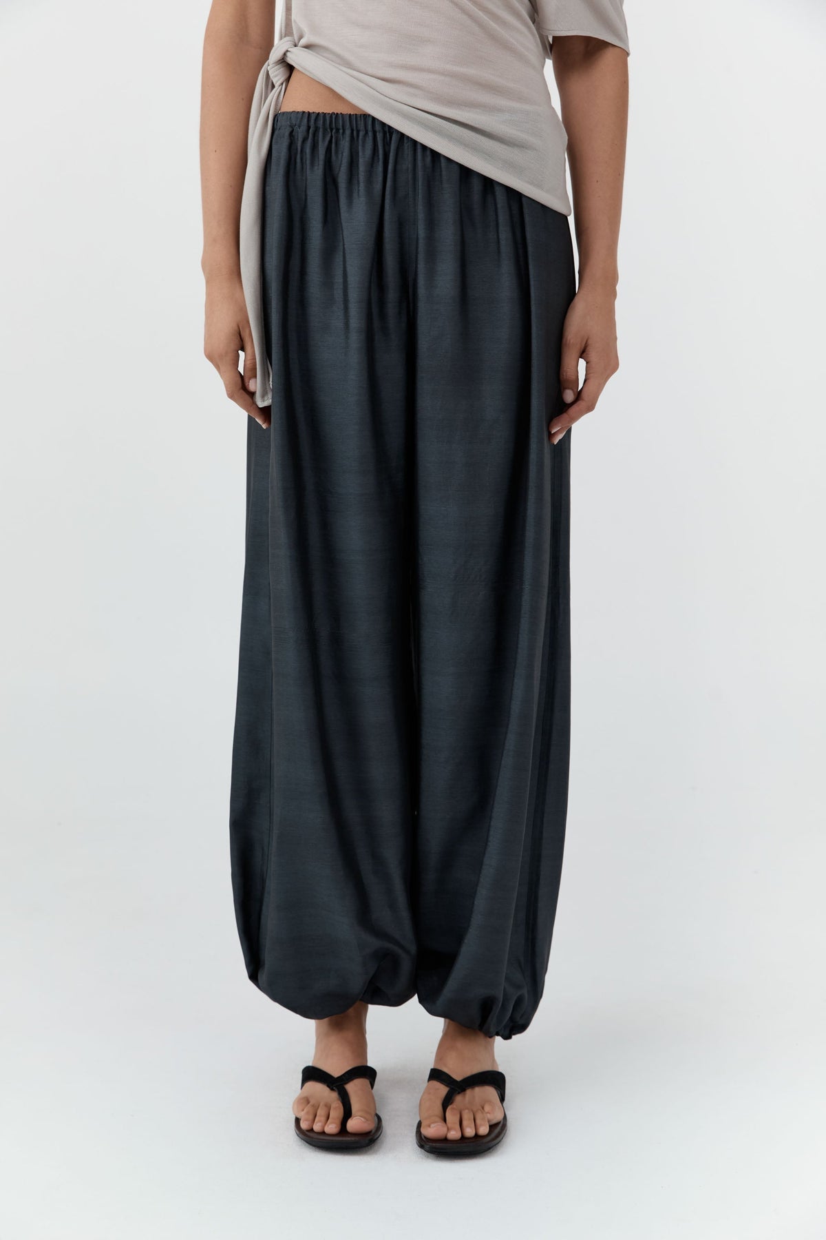 St. Agni at Alas Eius Washed Black Silk Adjustable Balloon Pants with elastic waistband