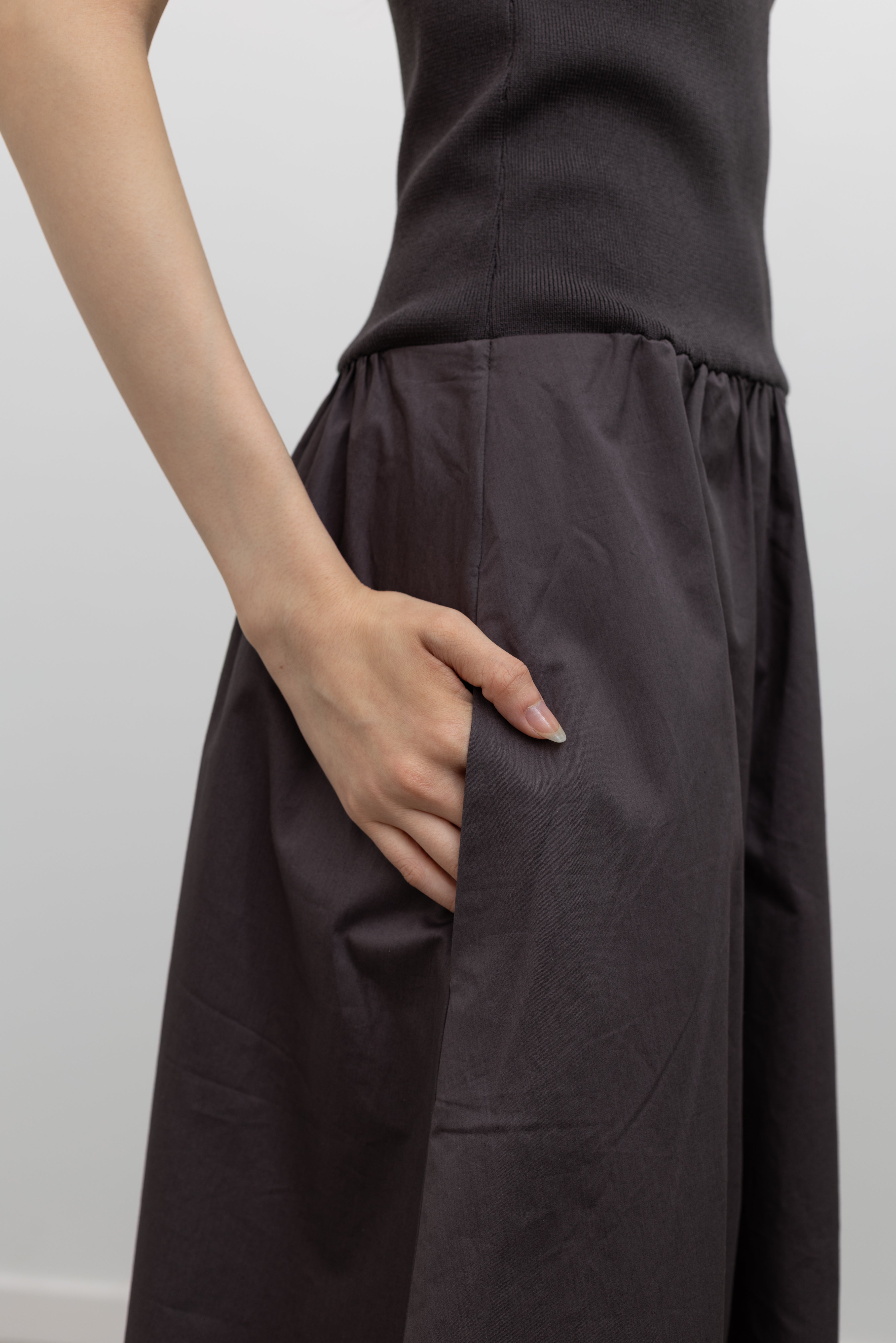 St. Agni women's chocolate brown maxi dress with a fitted knit bodice, halter neckline, and gathered poplin skirt for an elevated minimalist look at Alas Eius.