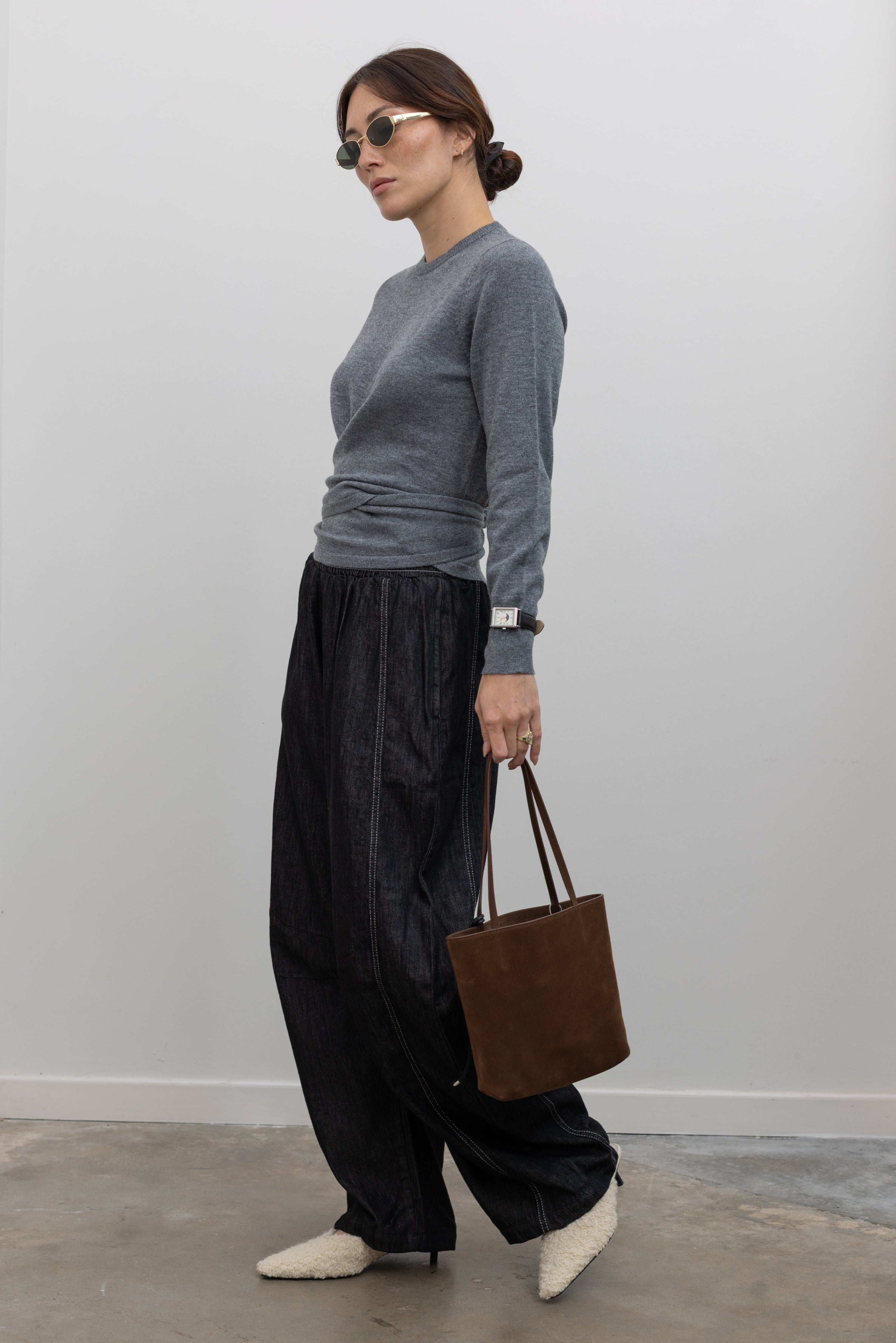 TELA carded wool crew neck sweater with sculptural draped shape at Alas Eius