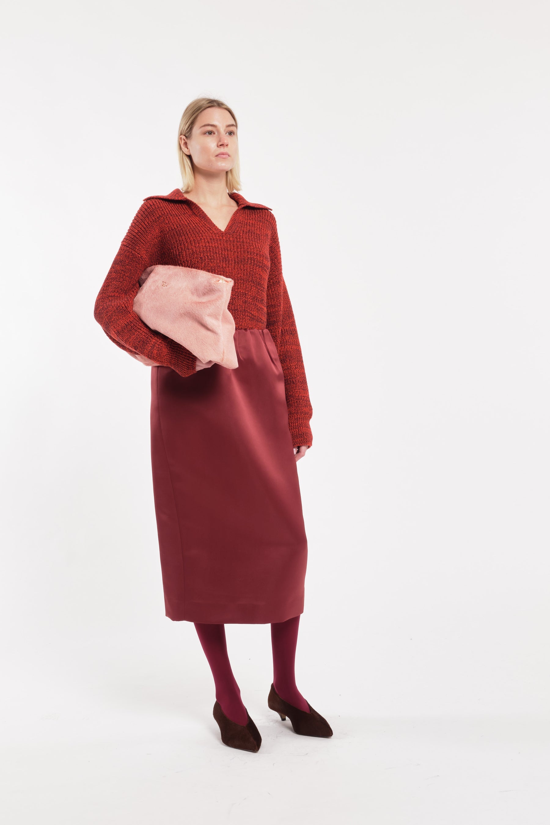 Tela dusty pink pony hair clutch bag styled for Fall/Winter 2026 at Alas Eius