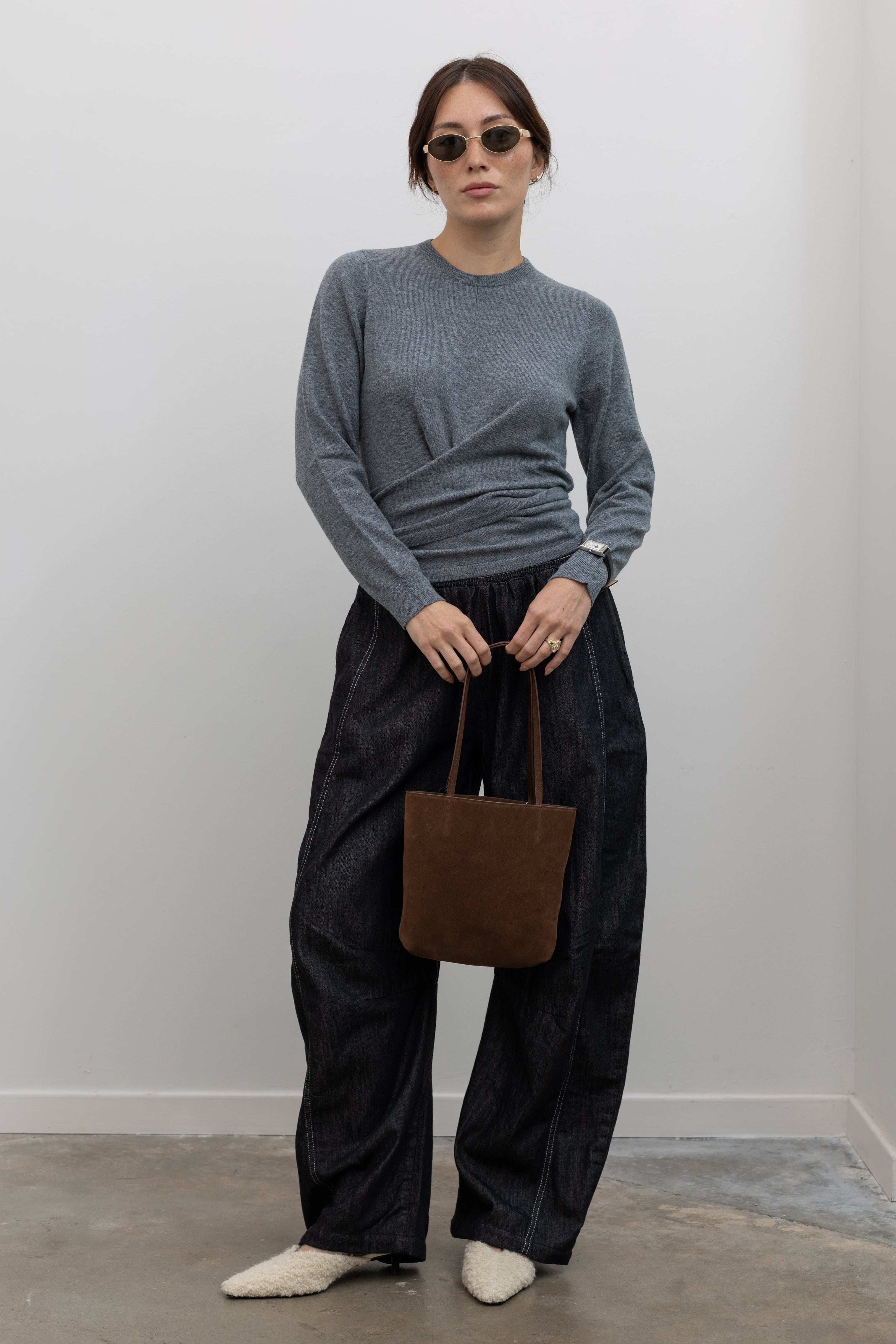 TELA grey melange long sleeve knit top with adjustable self tie fastening at Alas Eius
