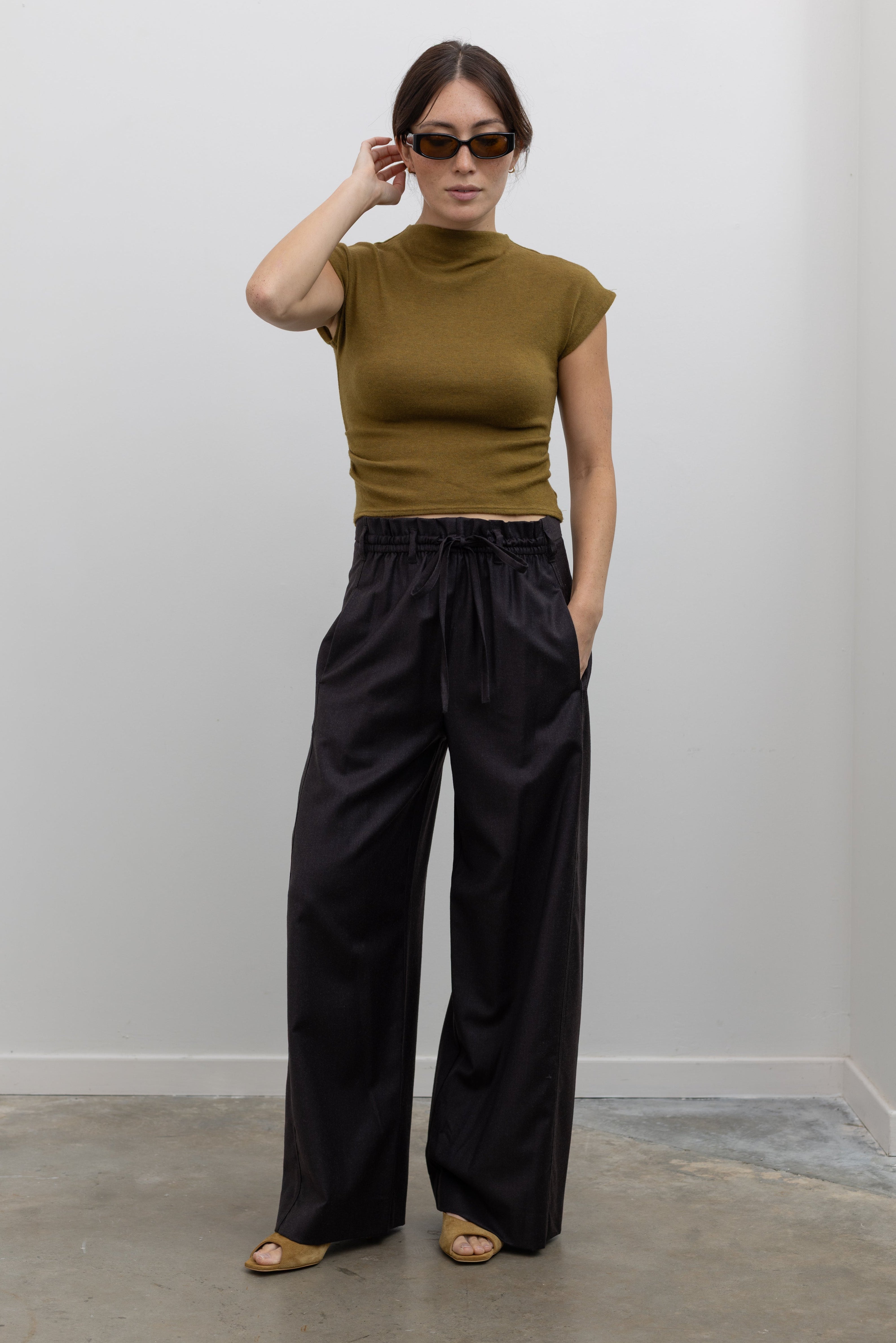 Tela Lucio dark brown wool-blend wide-leg pant with a drawstring waistband and side pockets at alas eius.