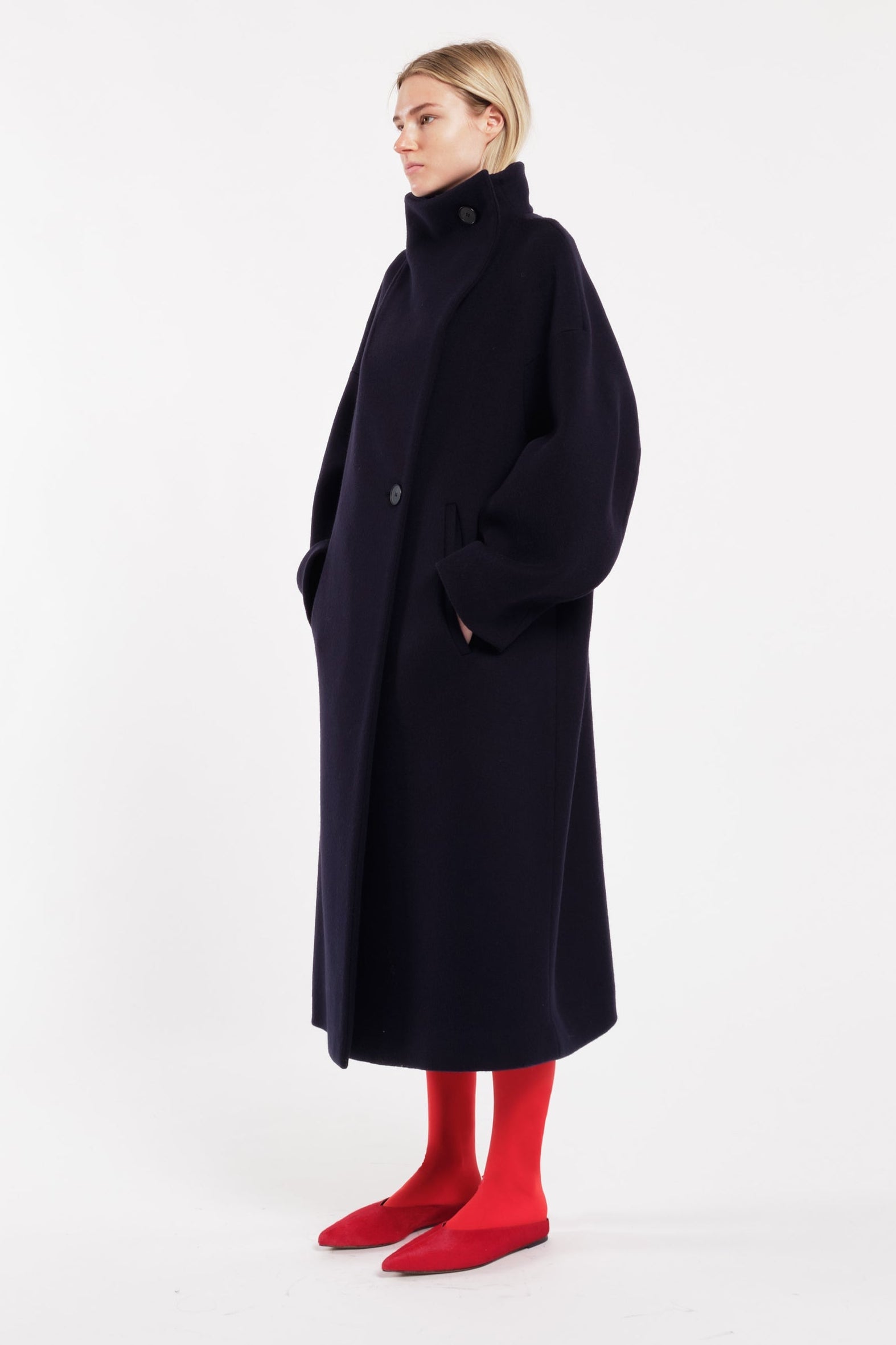 Tela Manami Fall/Winter 2026 red hair-on leather pointed toe mules at Alas Eius