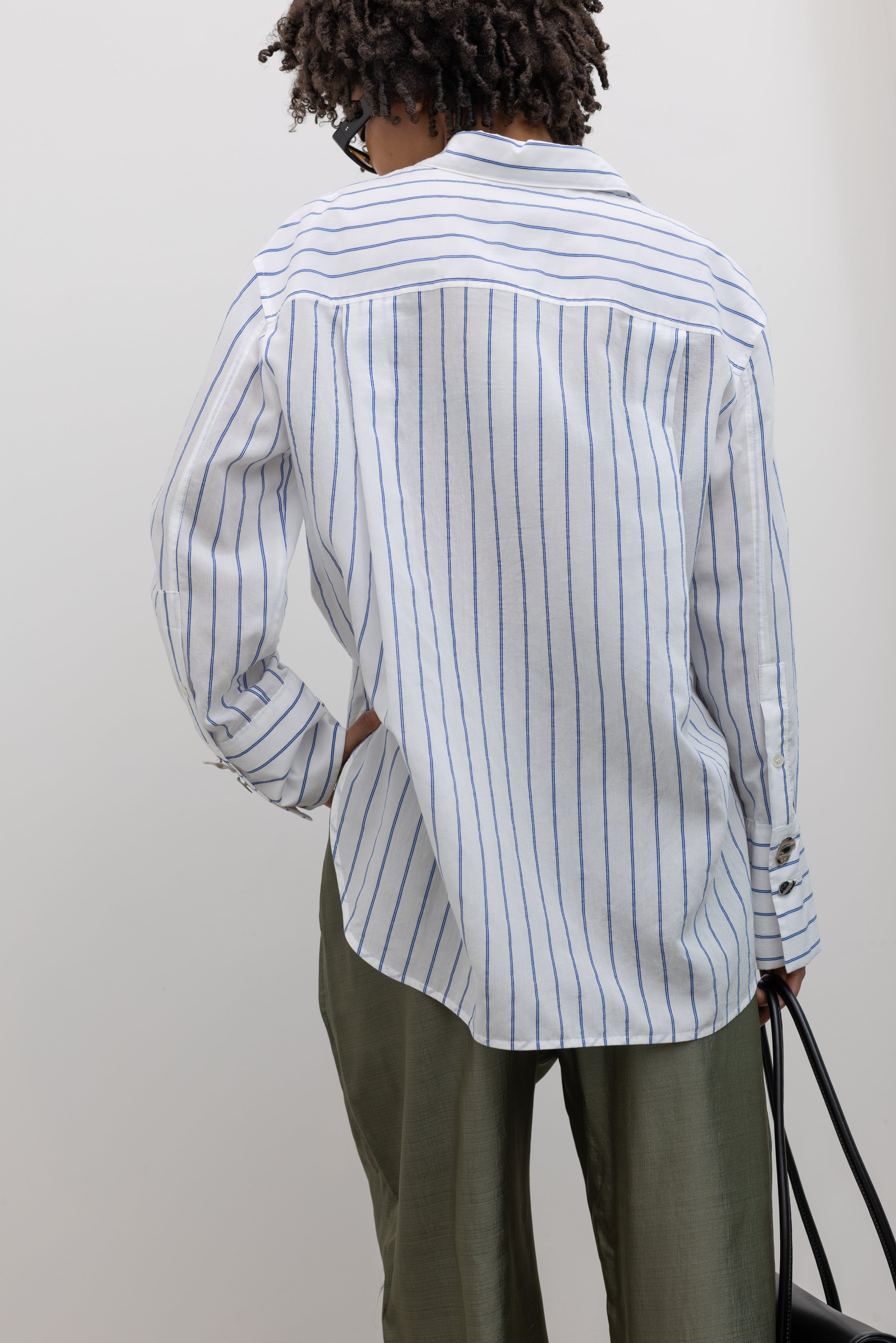 Tela relaxed fit striped shirt designer womenswear at Alas Eius