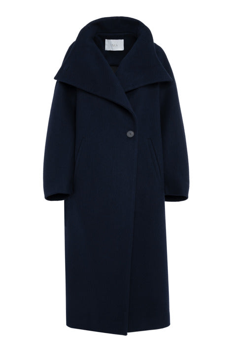 Tela Scott midnight blue wool blend coat with high neck and sculptural silhouette at Alas Eius