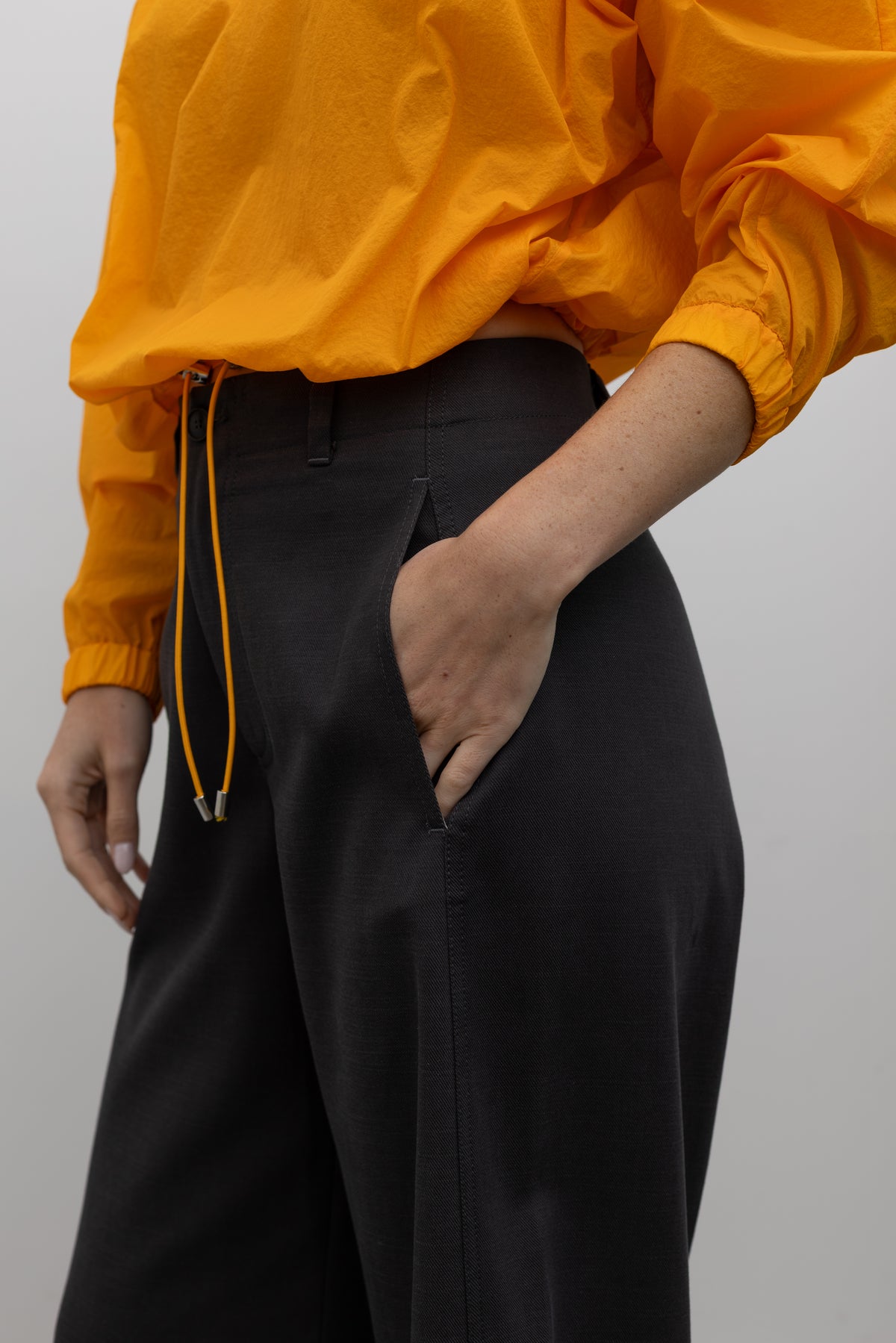 Tela Vanda dark grey relaxed trousers full length at Alas Eius